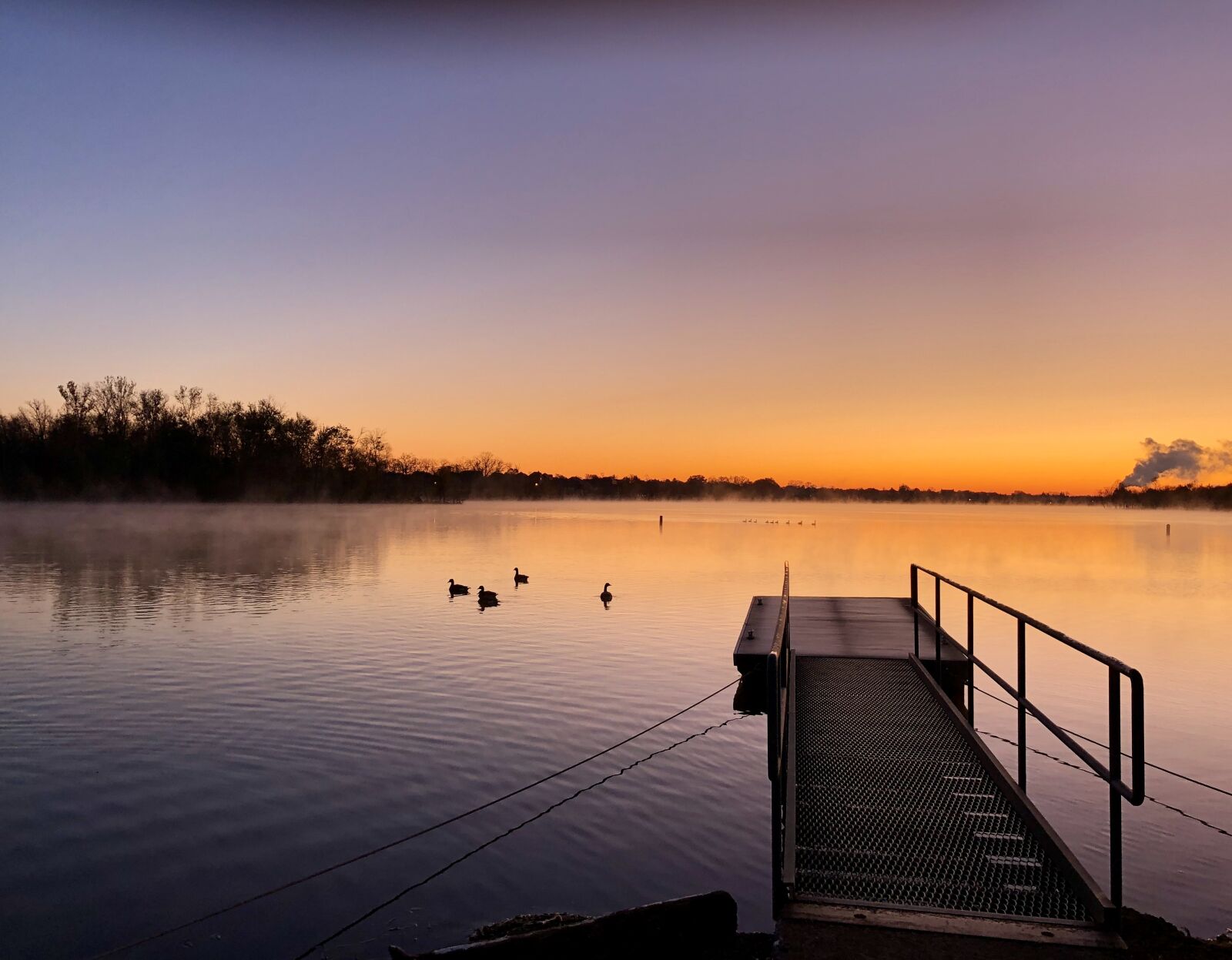 iPhone X back dual camera 4mm f/1.8 sample photo. Sunrise, lake, dock photography