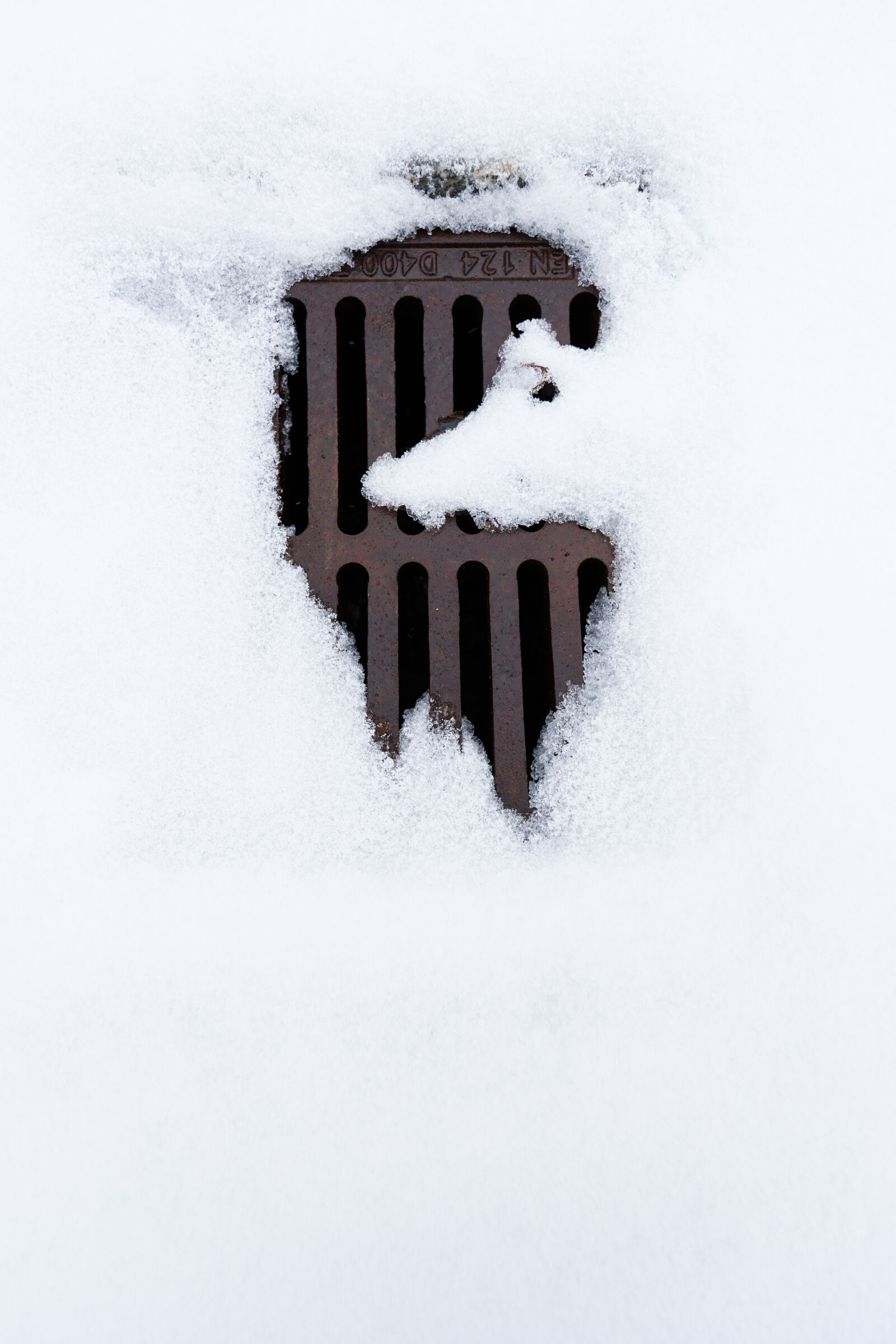 Tamron 11-20mm F2.8 Di III-A RXD sample photo. Snow sewer photography