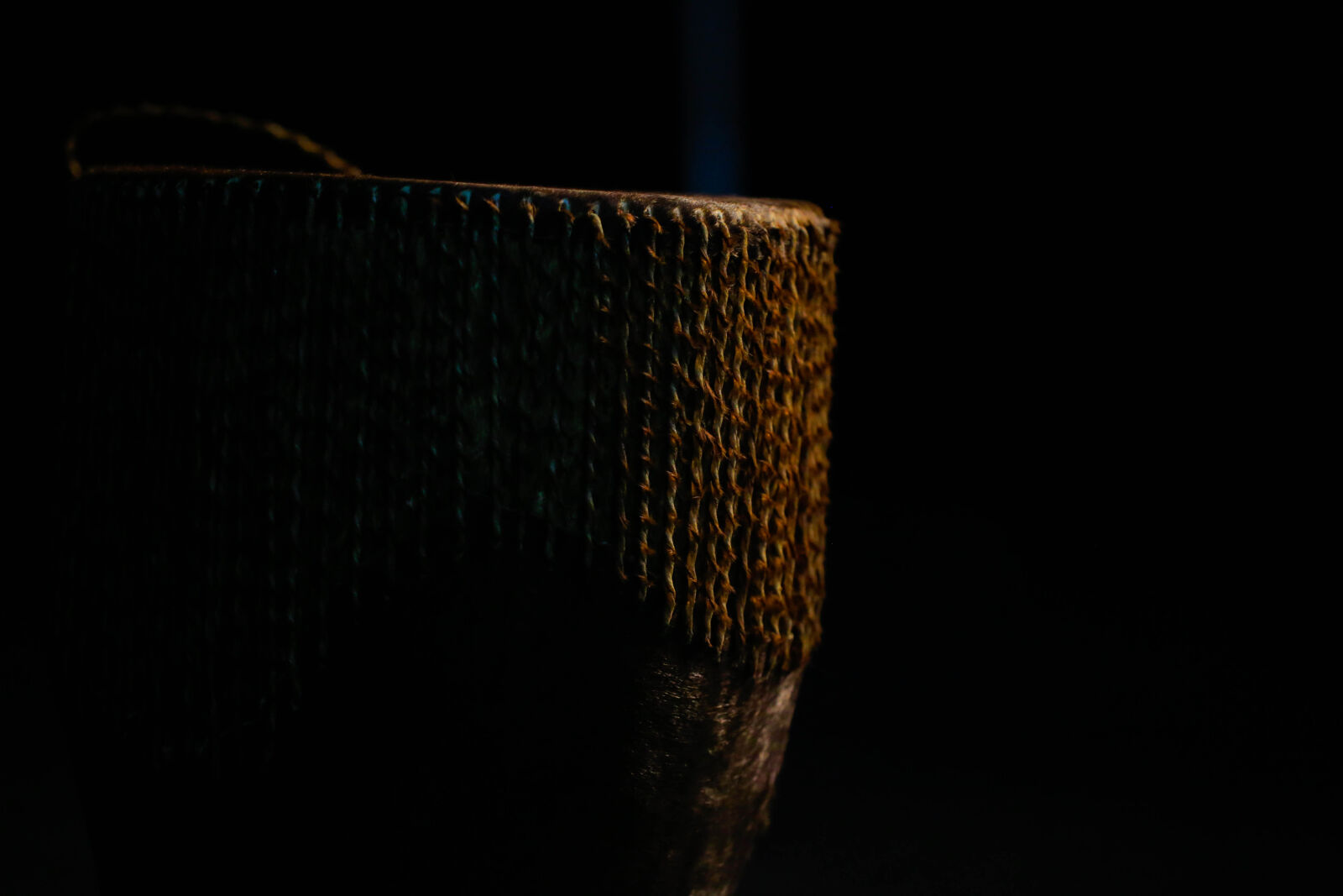 Canon EF 100mm F2.8L Macro IS USM sample photo. African, culture, dark, room photography