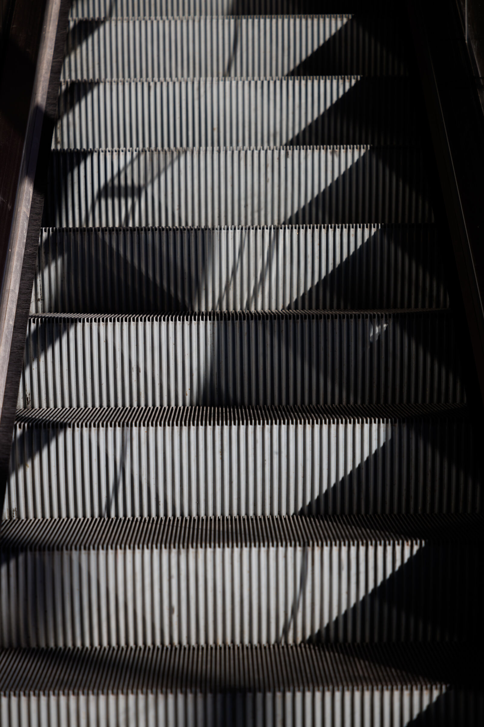 Canon EOS R5 sample photo. Shadow at the escalator photography