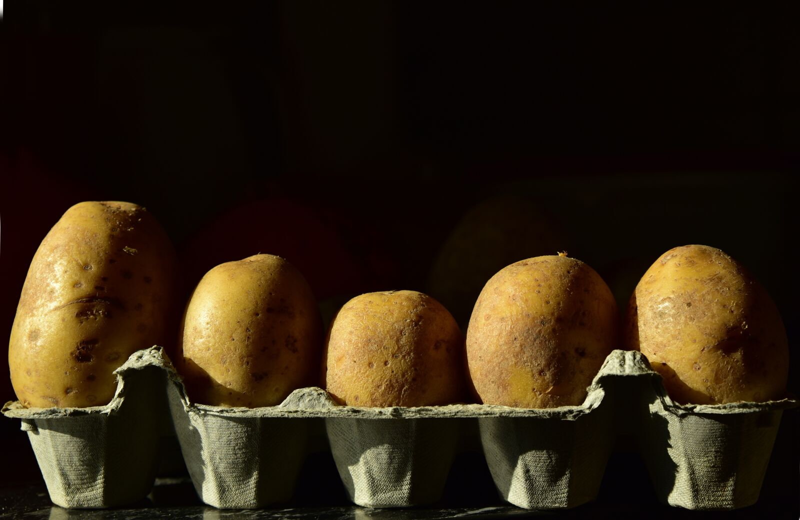 Nikon D750 sample photo. Potatoes, egg carton, ingredient photography