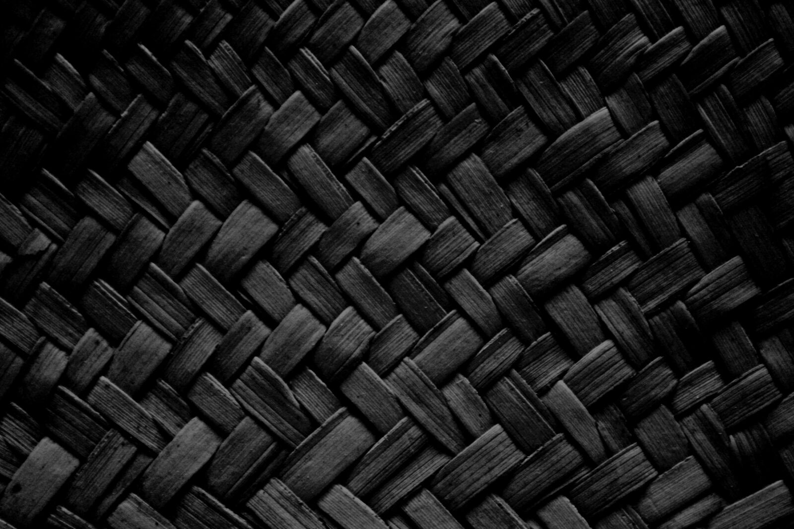 Canon EOS 1000D (EOS Digital Rebel XS / EOS Kiss F) + f/3.5-5.6 IS sample photo. Black, woven, straw, texture photography