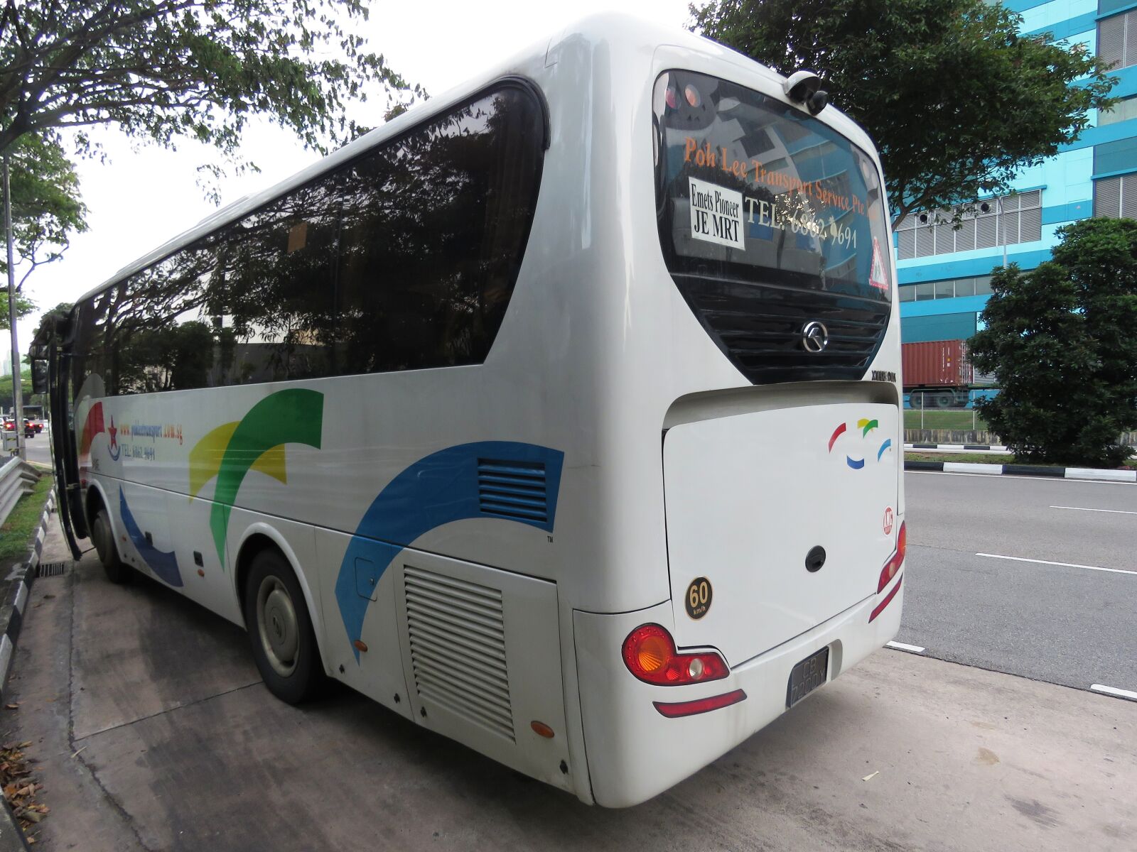 Canon PowerShot SX60 HS sample photo. Bus, bus stop, singapore photography