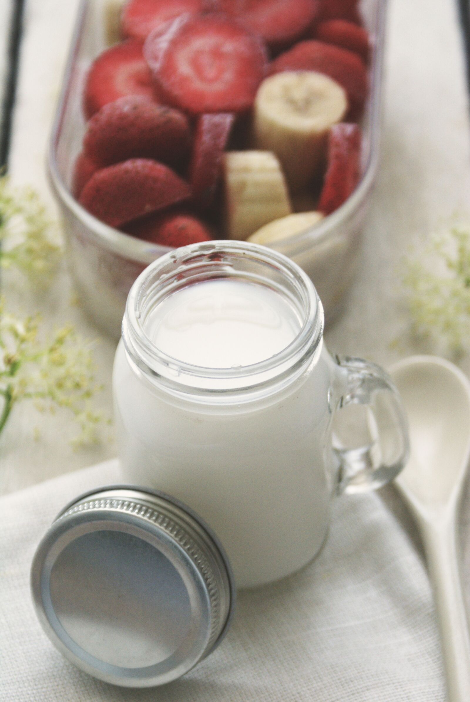 Sony Alpha DSLR-A100 sample photo. Milk, banana, strawberries photography