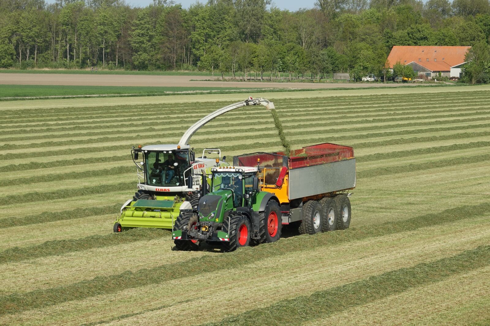 Sony Cyber-shot DSC-RX10 III sample photo. Grass, tractor, mow photography