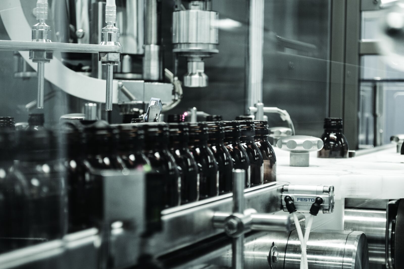 Nikon D3100 sample photo. Bottles, factory, medicine photography