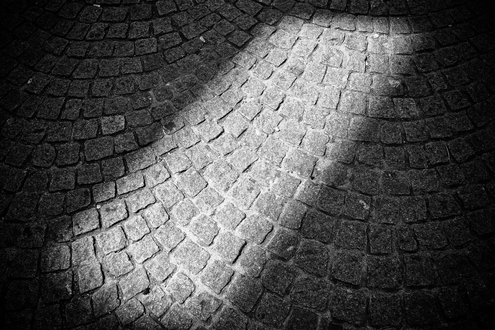 Olympus OM-D E-M10 sample photo. Road, patch, stones photography