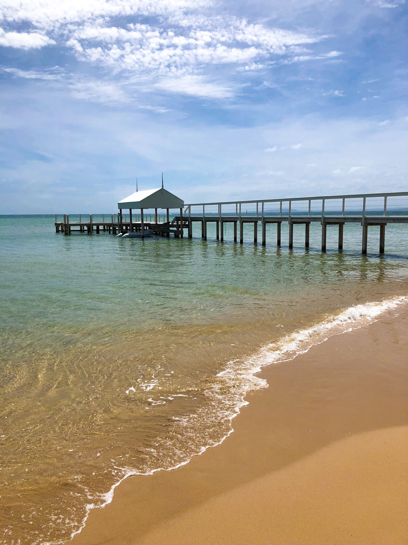 iPhone X back dual camera 4mm f/1.8 sample photo. Jetty, pier, water photography
