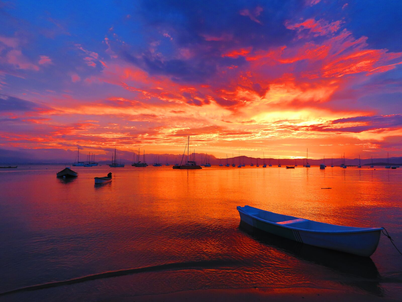 Canon PowerShot SX60 HS sample photo. Sunset, body of water photography
