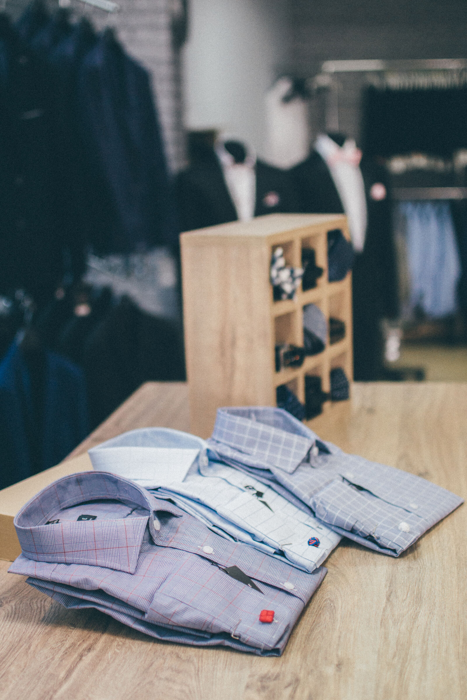 Nikon D3100 + Nikon AF-S DX Nikkor 35mm F1.8G sample photo. Clothes, store photography