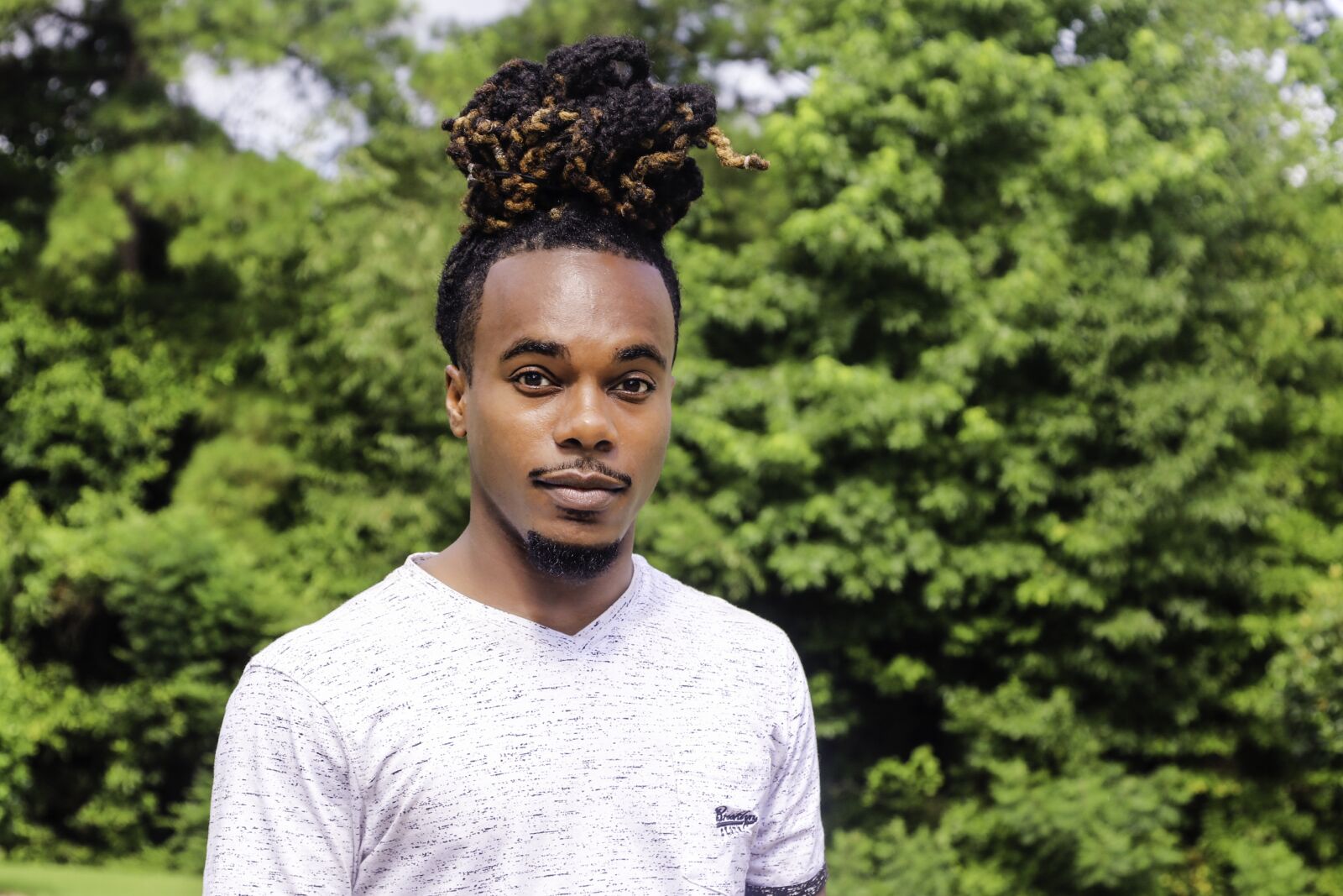 Canon EOS 7D Mark II sample photo. Black man, young man photography
