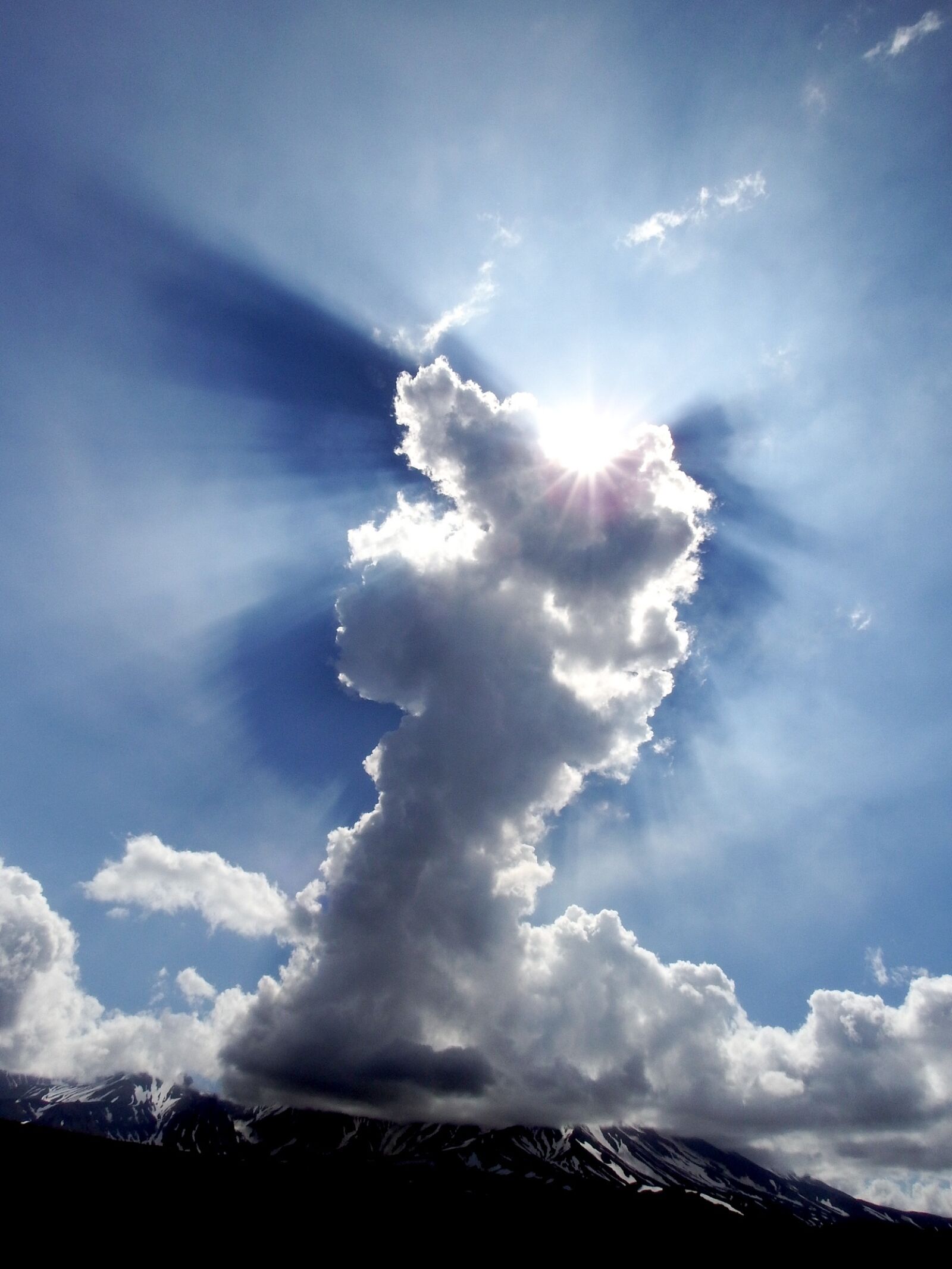 Fujifilm FinePix S1 sample photo. Cloud, sun, sky photography
