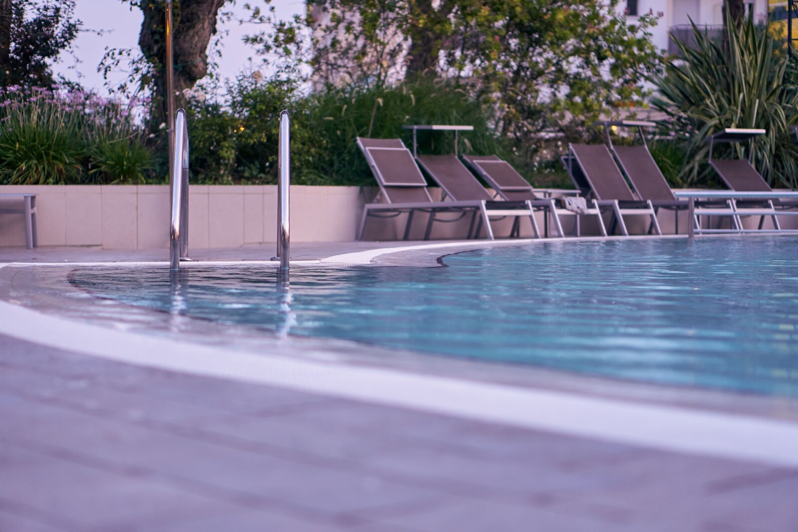 Sony E 50mm F1.8 OSS sample photo. Pool, swim, swimming pool photography