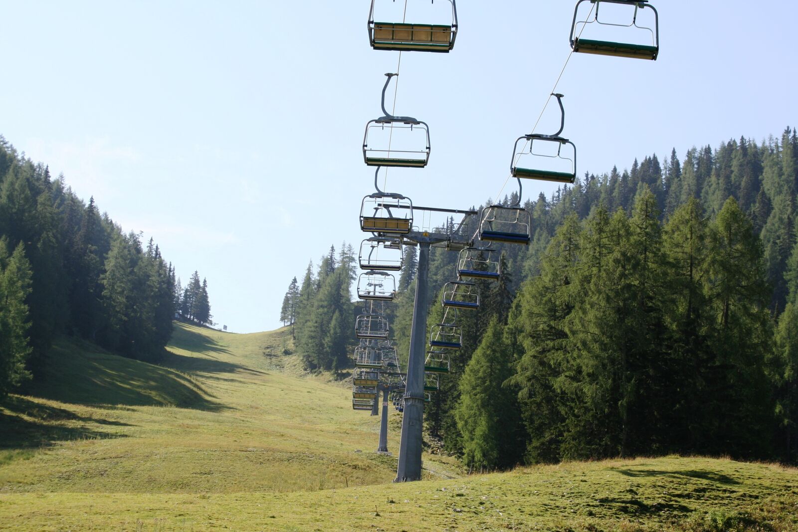 Canon EOS 350D (EOS Digital Rebel XT / EOS Kiss Digital N) sample photo. Chairlift, mountain, sky photography