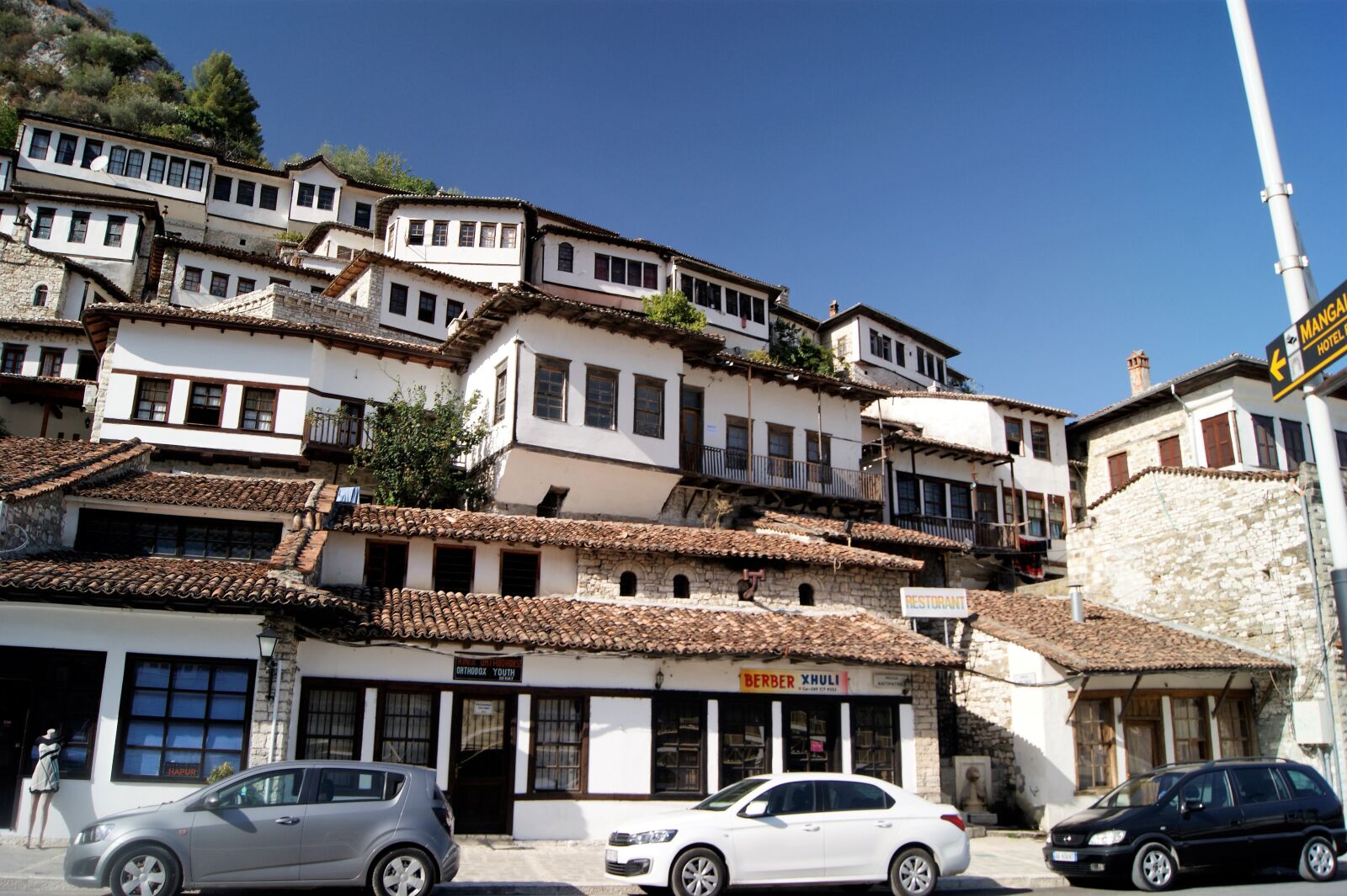 Sony Alpha DSLR-A290 sample photo. White balkan houses, berat photography