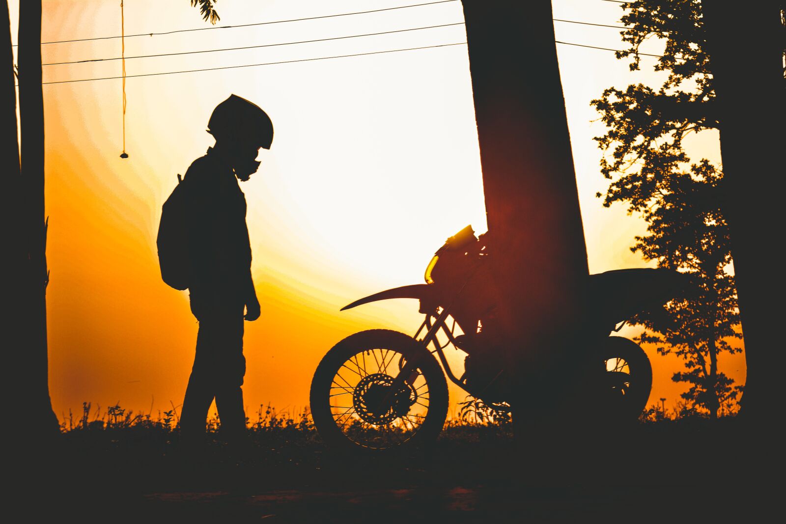 Nikon D5200 sample photo. Sillhoutte, sunset, biker photography