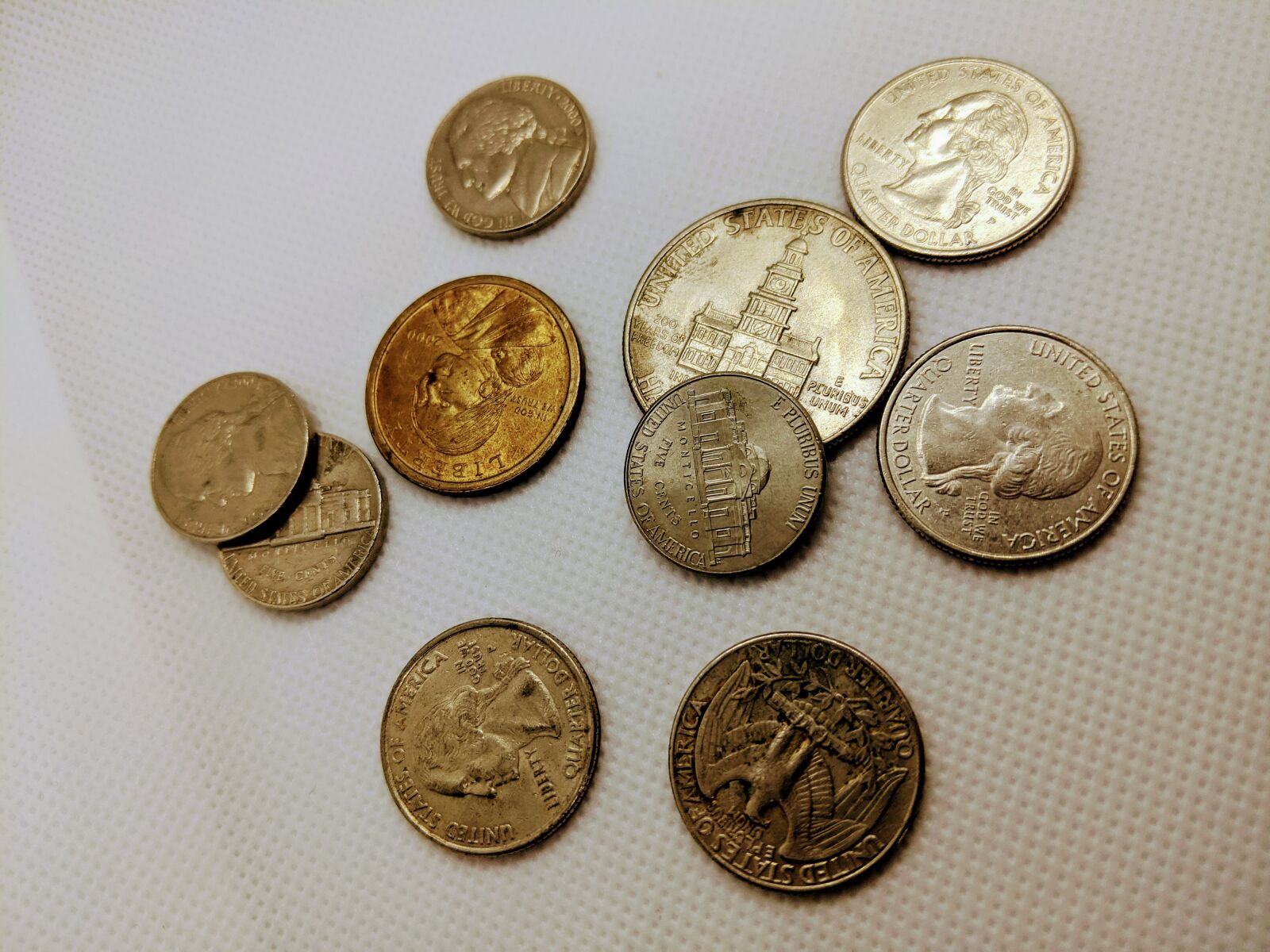 Google Pixel 3a XL sample photo. Coins, quarters, dimes photography