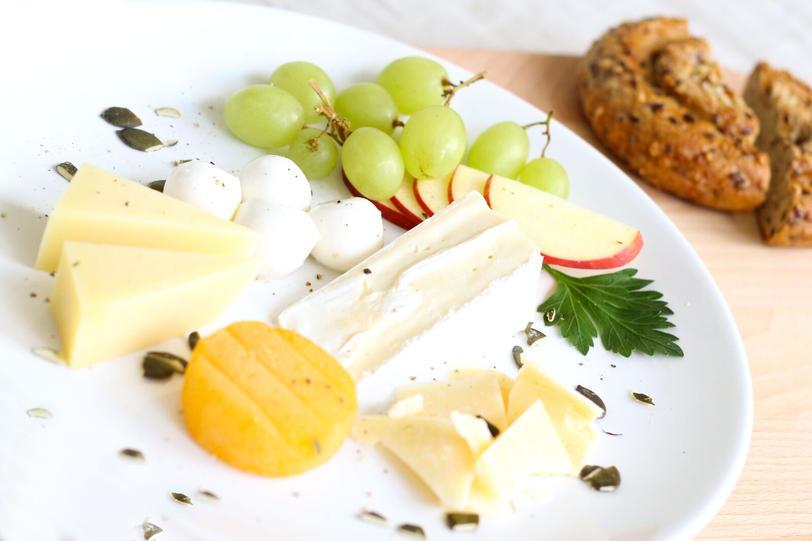 Canon EOS 60D + Canon EF 50mm F1.8 II sample photo. Cheese, whole wheat bread photography