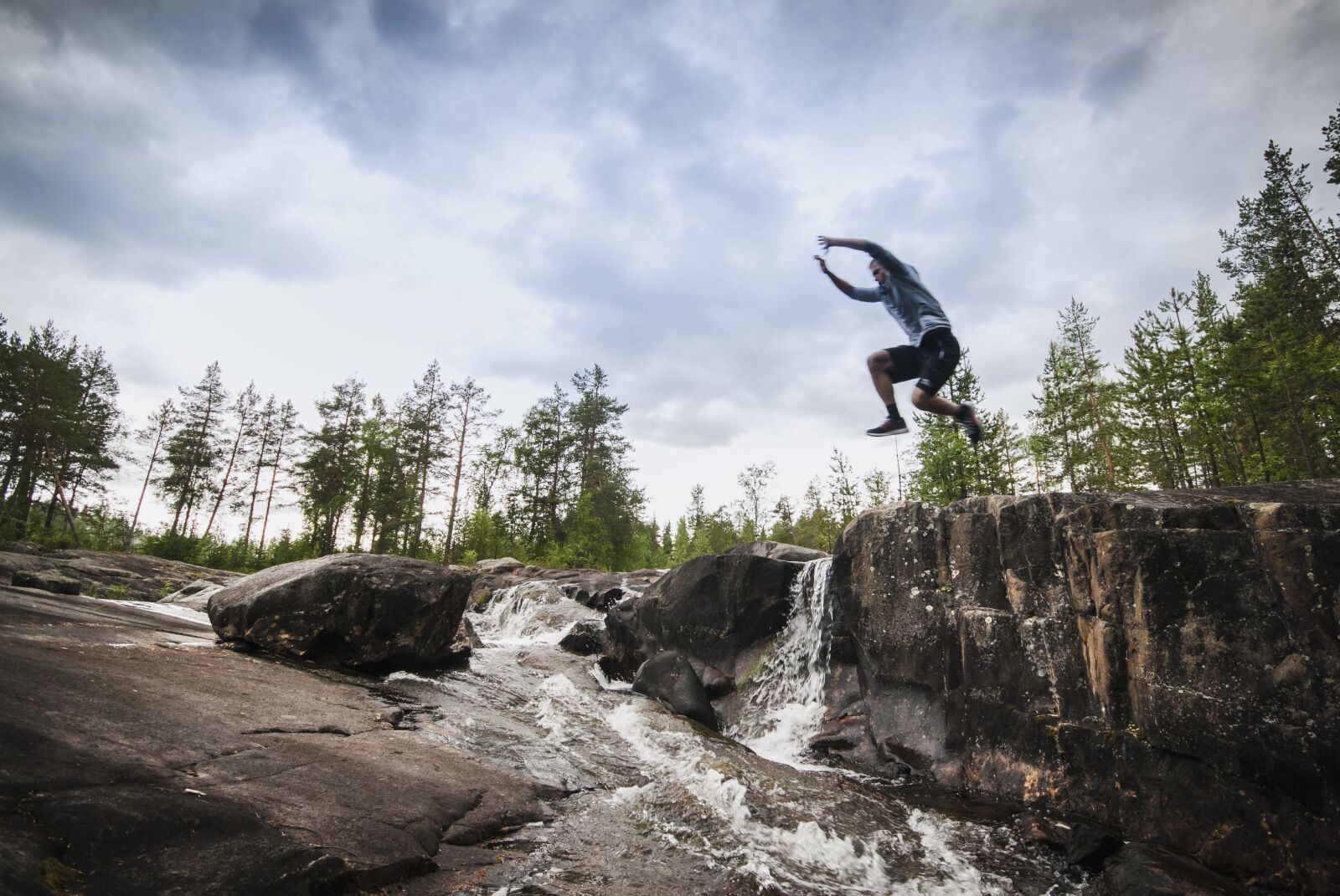 Nikon D60 sample photo. Jump, rocks, rock photography