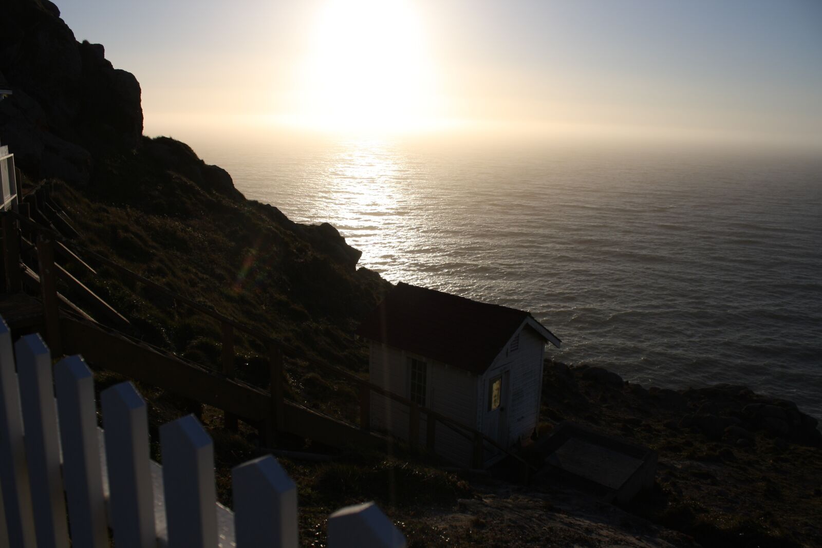 Canon EOS 1000D (EOS Digital Rebel XS / EOS Kiss F) sample photo. Sunset, ocean, lighthouse photography