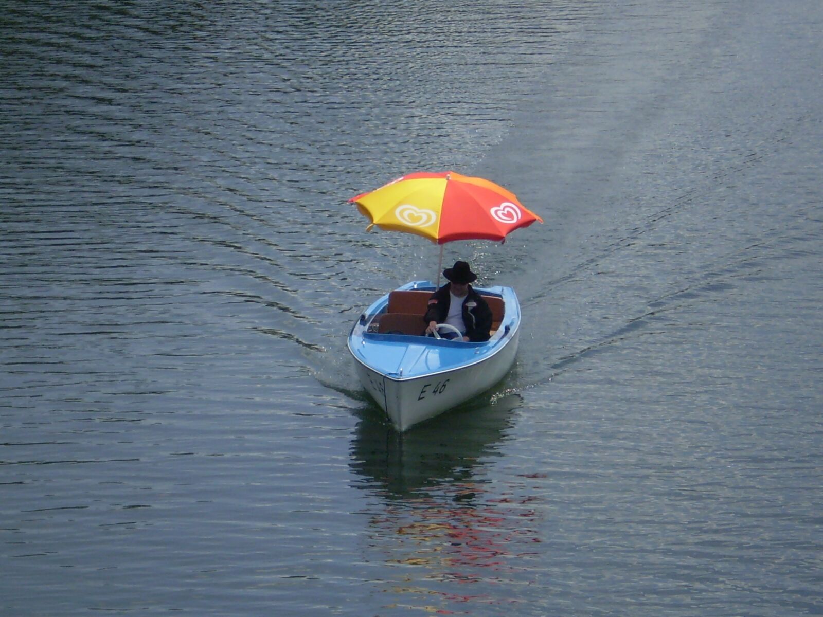 Olympus FE170,X760 sample photo. Pedal boat, parasol, river photography