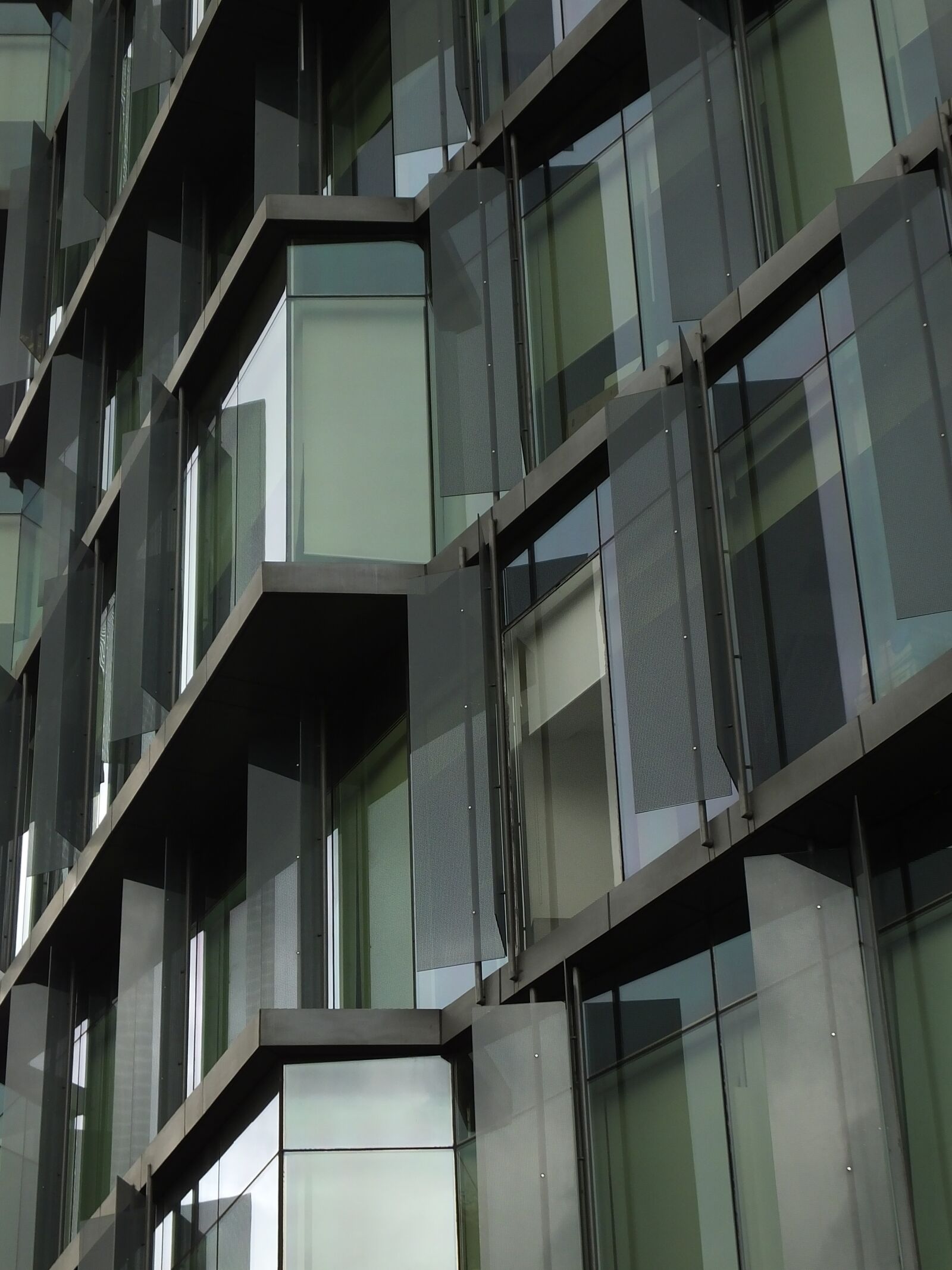 Fujifilm FinePix HS50 EXR sample photo. Building, glass windows, architecture photography