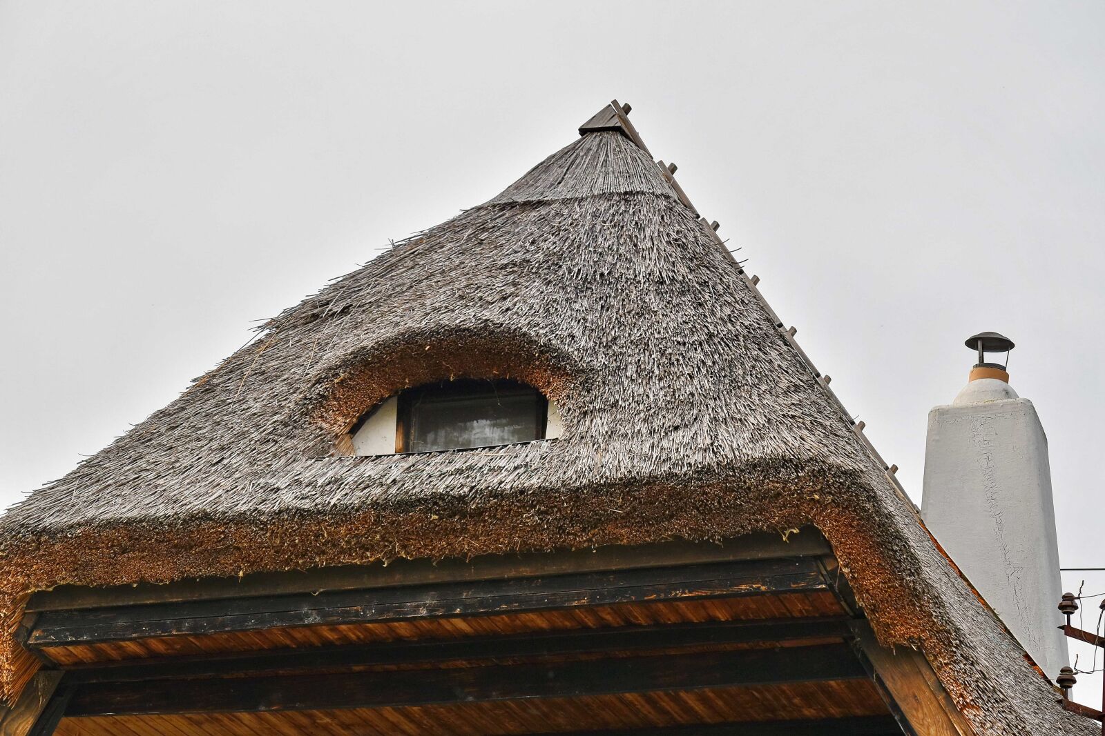 Nikon D5500 sample photo. Balcony, chimney, roof, straw photography