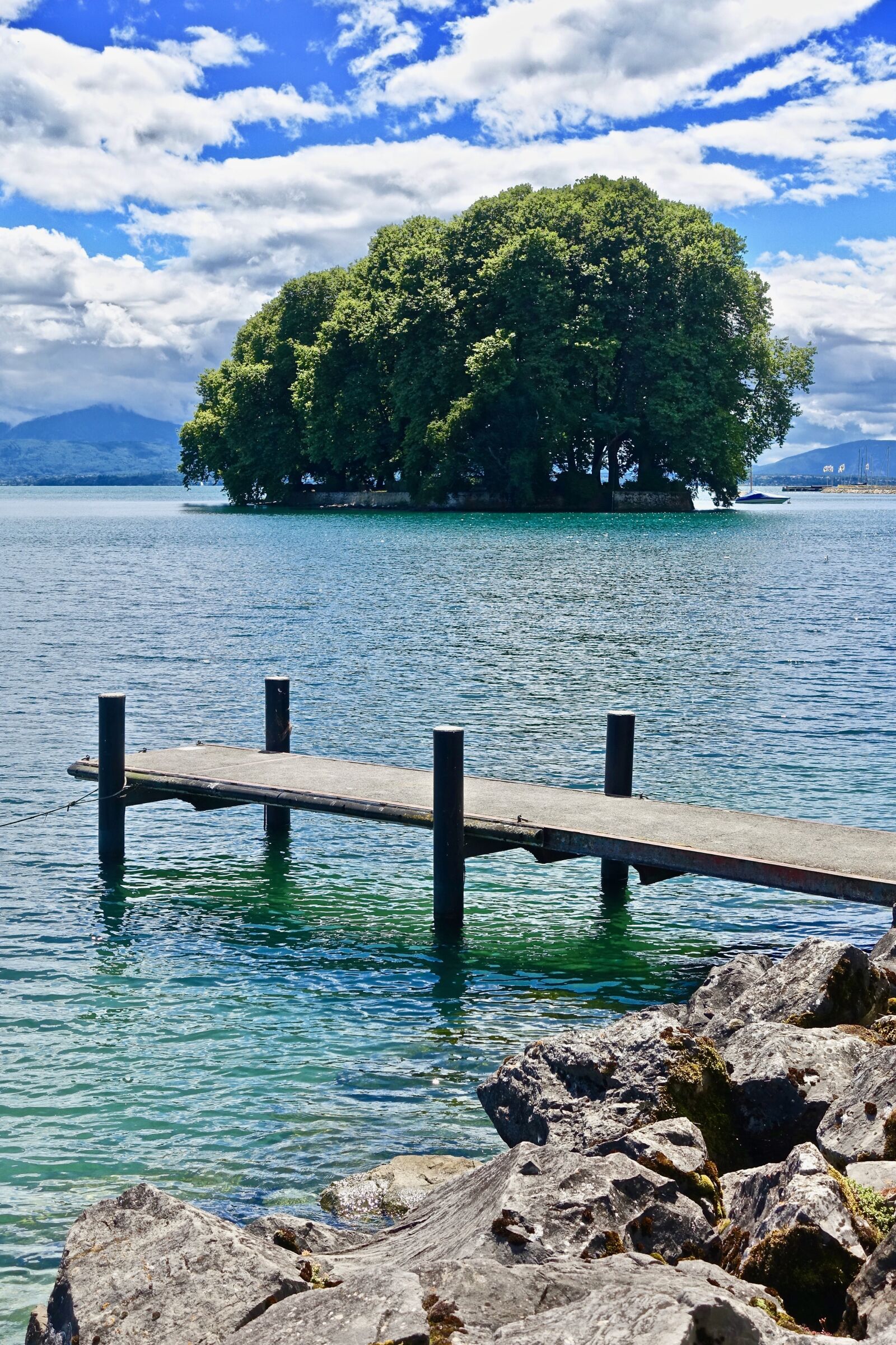 Sony Cyber-shot DSC-RX100 III sample photo. Island, pier, water photography