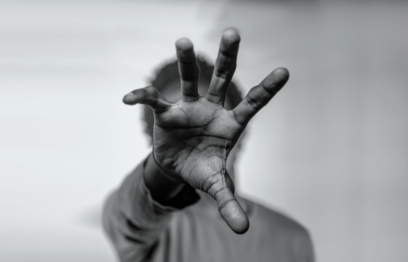 Canon EF 24-105mm F4L IS USM sample photo. Hand, man, white background photography