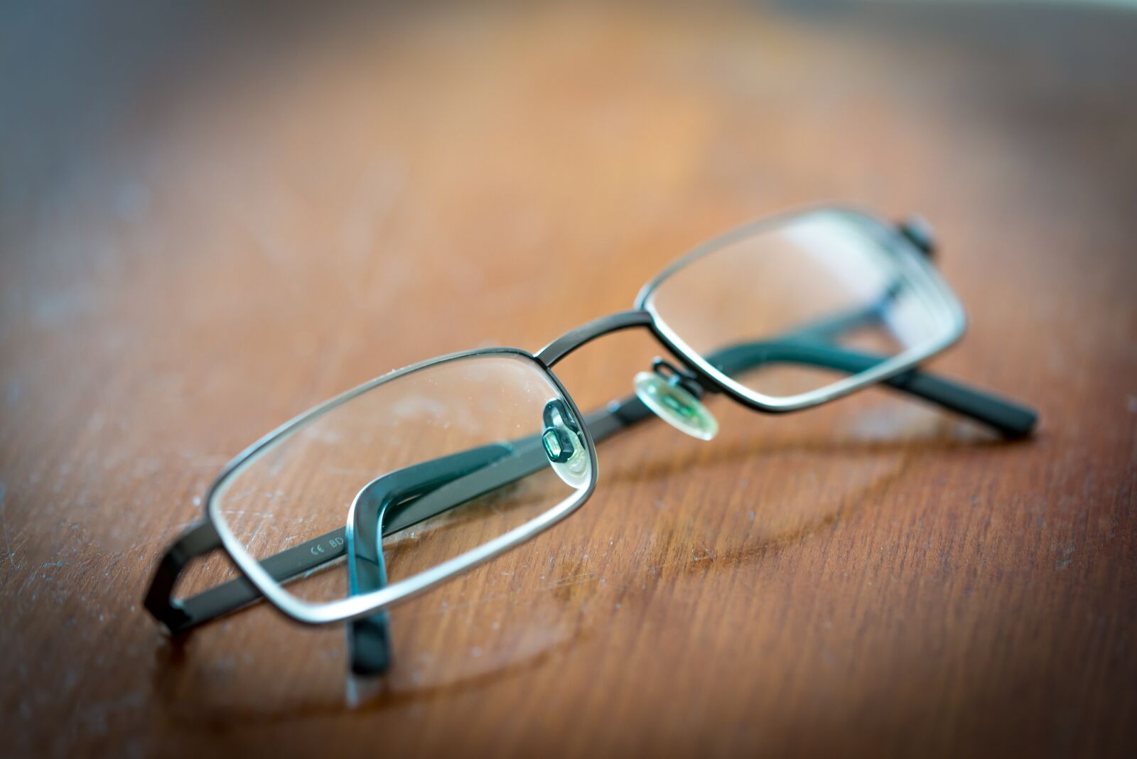 Nikon D610 sample photo. Glasses, table, read photography