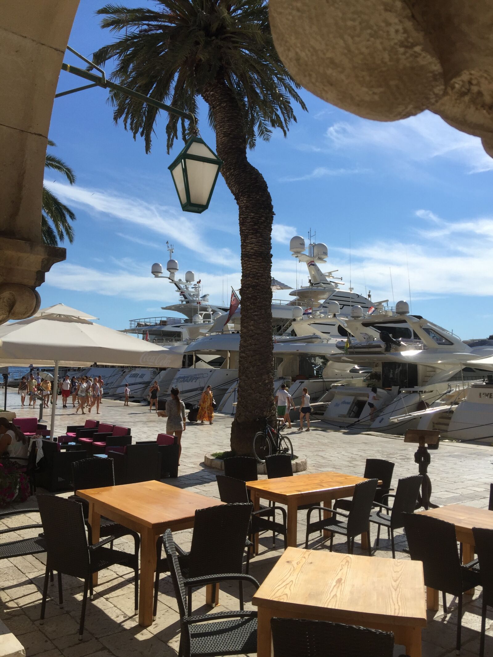 iPhone 6 Plus back camera 4.15mm f/2.2 sample photo. Palms, port, restaurant, summer photography