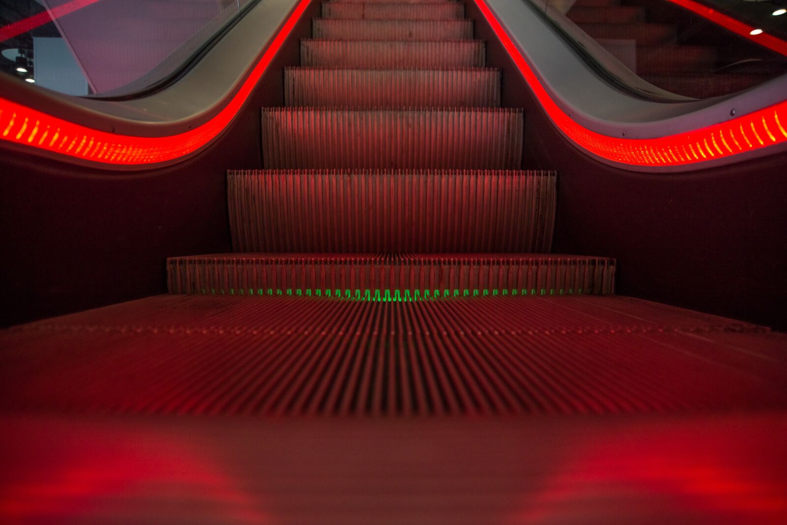 Nikon D610 sample photo. Escalator, red, moving photography
