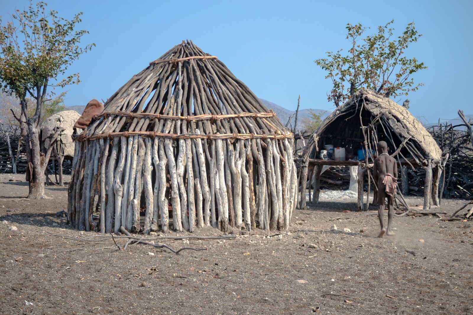 Nikon D3100 sample photo. Africa, himba, house himba photography