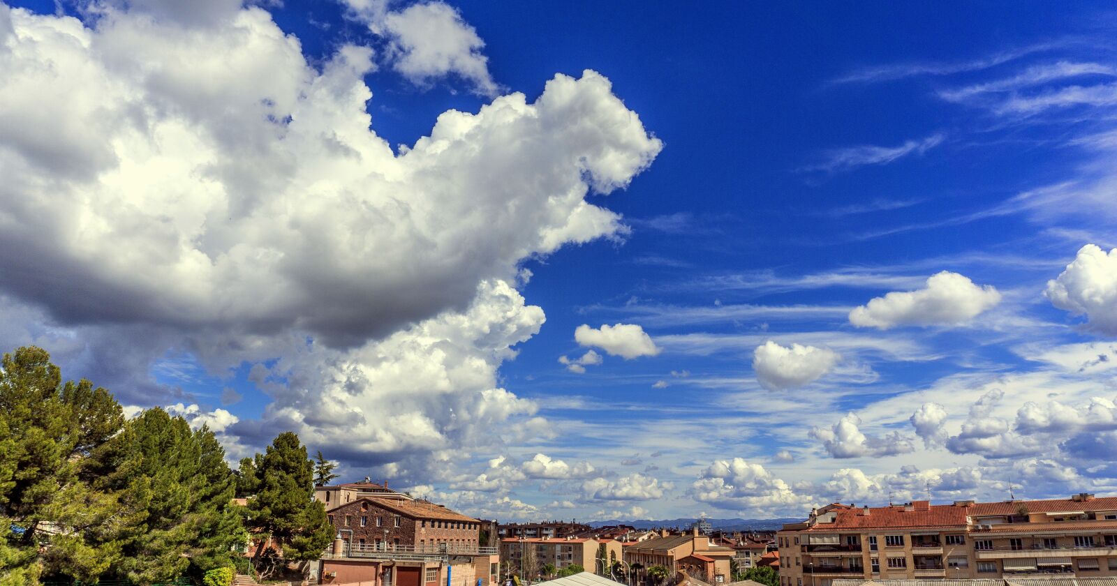 Sony E 16-50mm F3.5-5.6 PZ OSS sample photo. Clouds, blue sky, nature photography