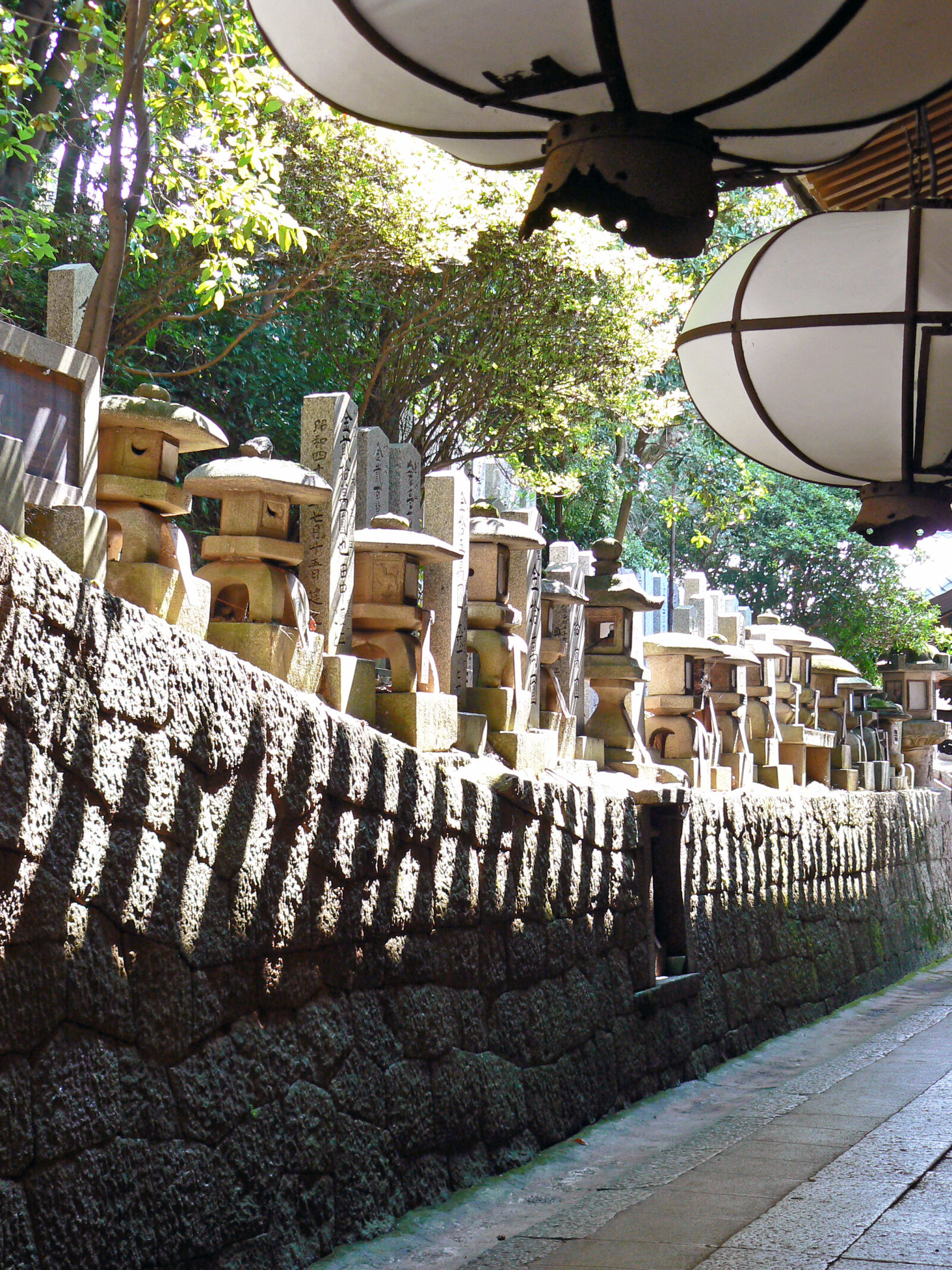 Panasonic DMC-FZ7 sample photo. Graves, japan, shrine, trees photography