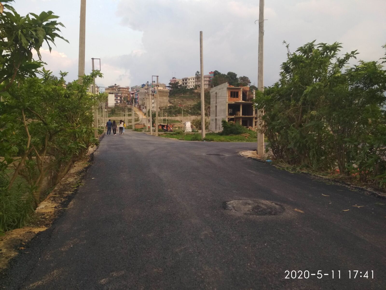 Xiaomi Redmi 4X sample photo. Pitch-road, houses, road photography