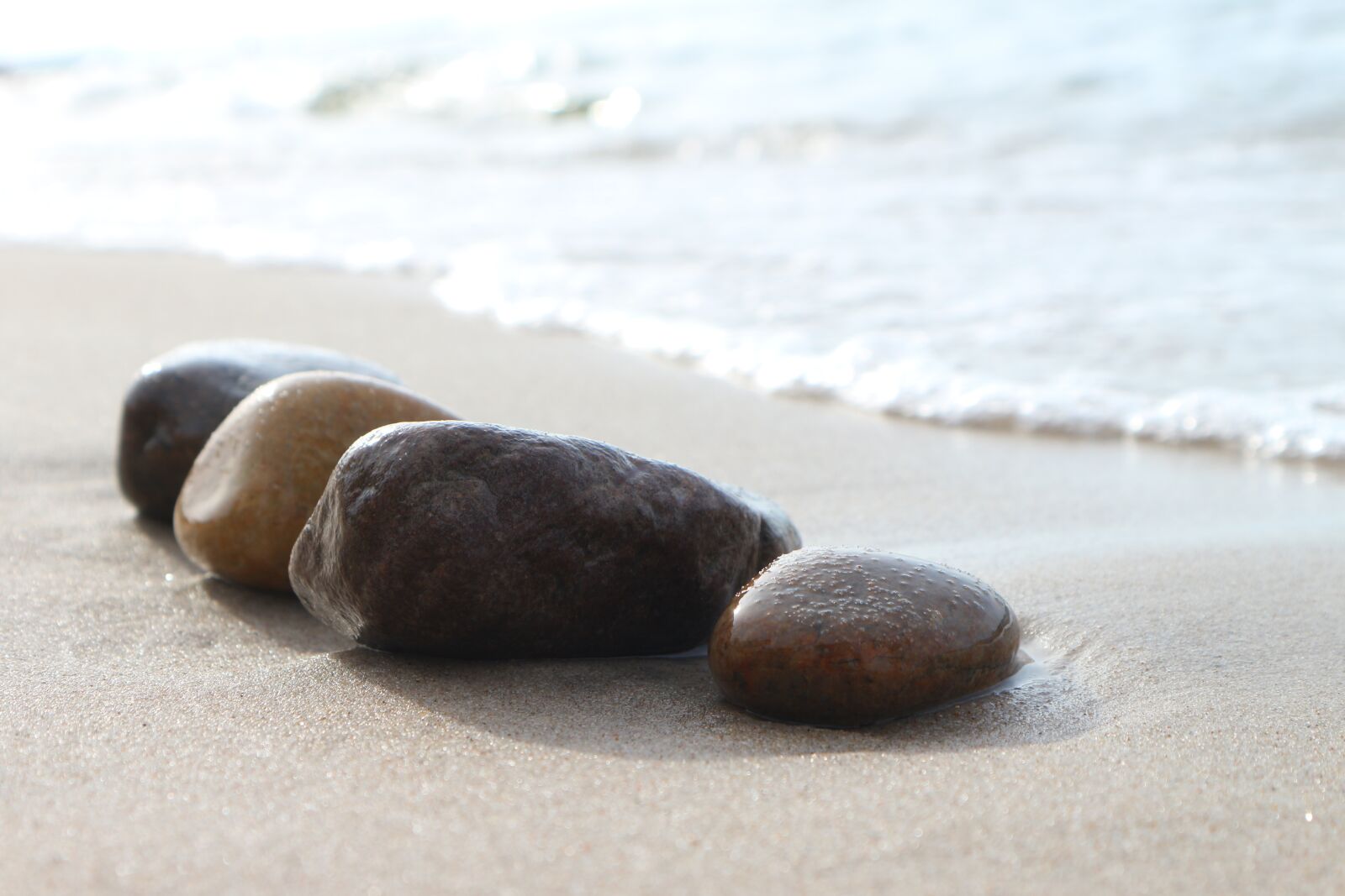 Canon EOS M10 sample photo. The stones, sea, the photography