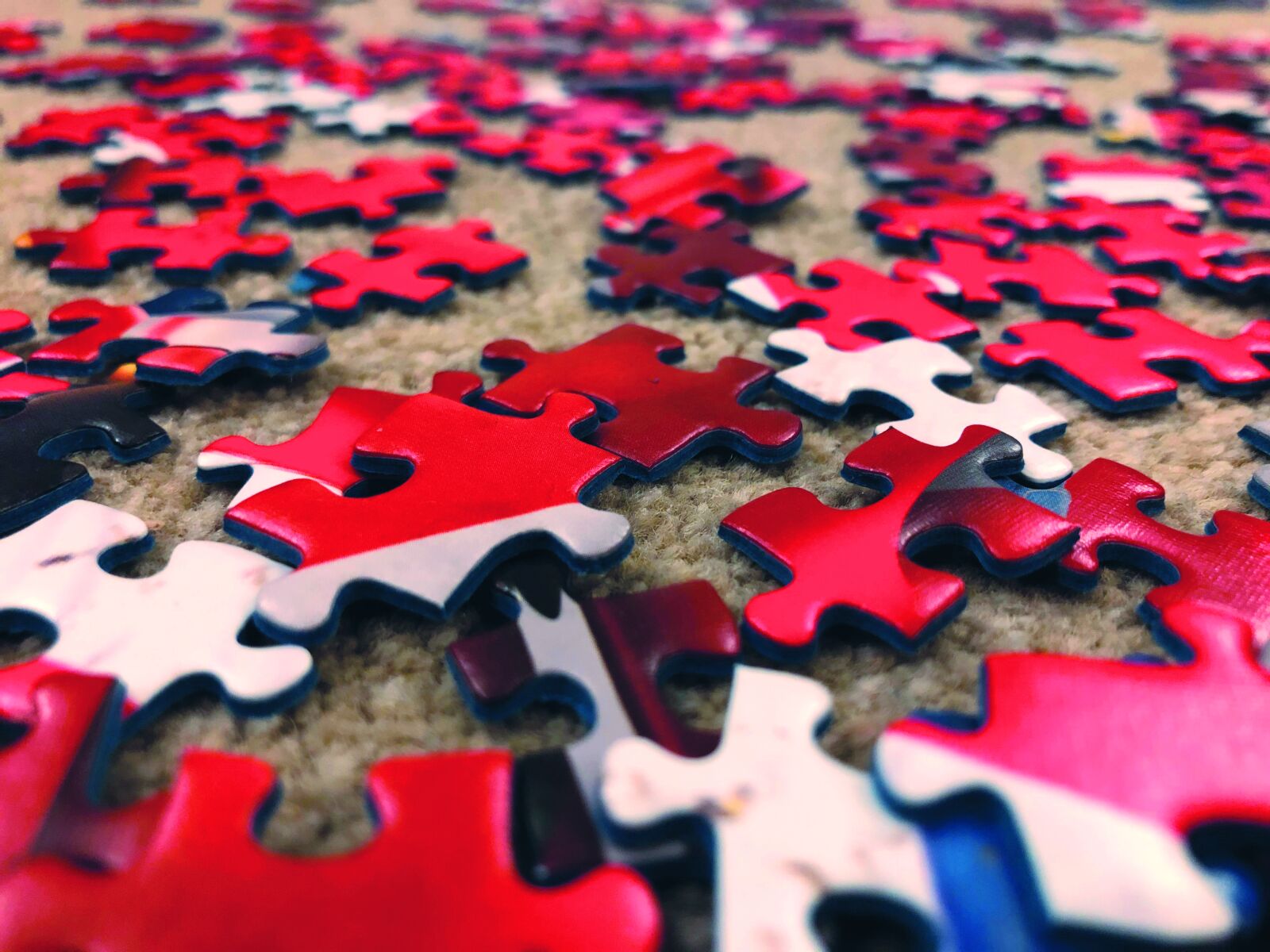 Apple iPhone 8 sample photo. Red puzzle pieces, pastime photography