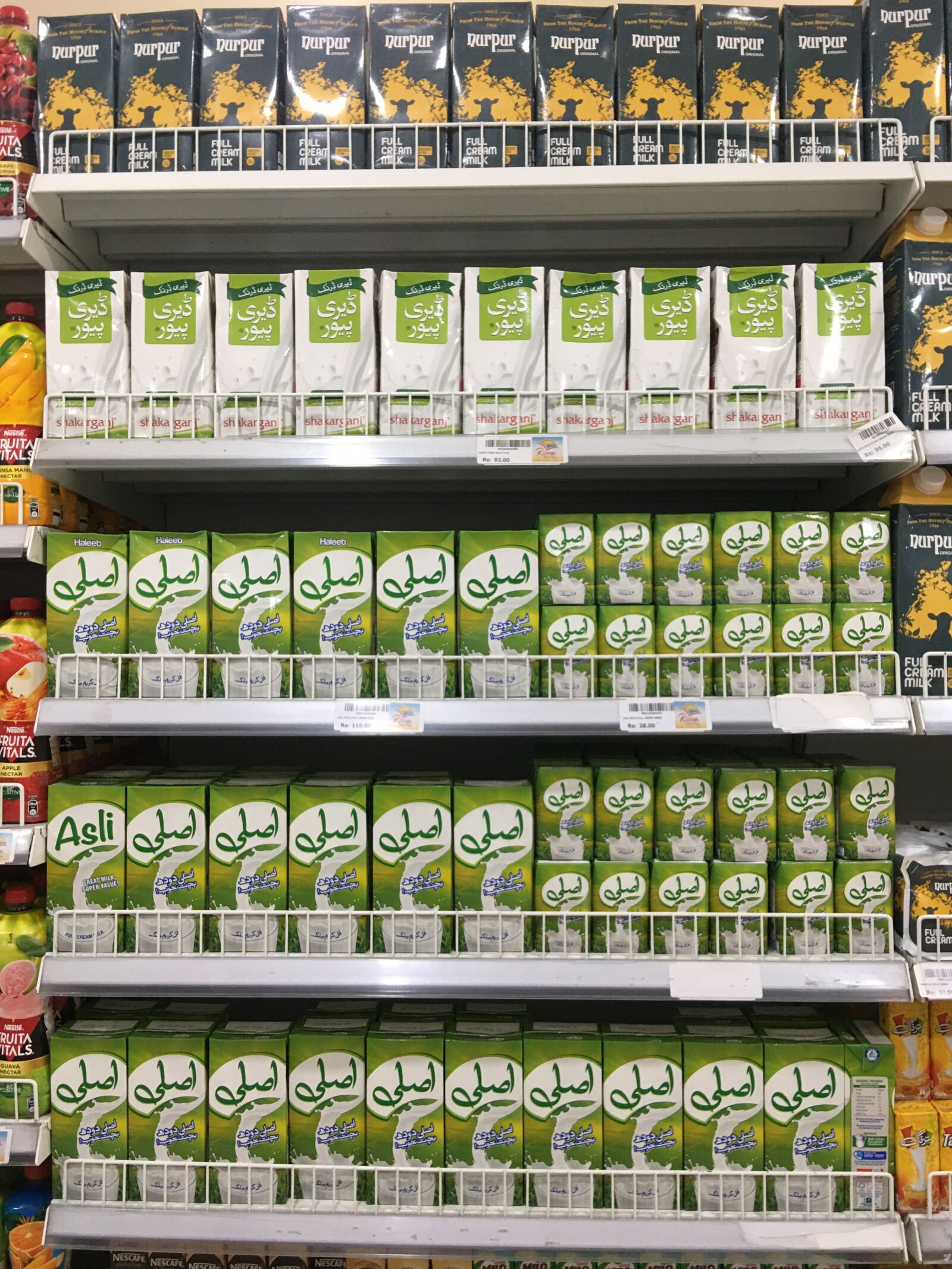 iPhone 6s Plus back camera 4.15mm f/2.2 sample photo. Dairy product, display, store photography