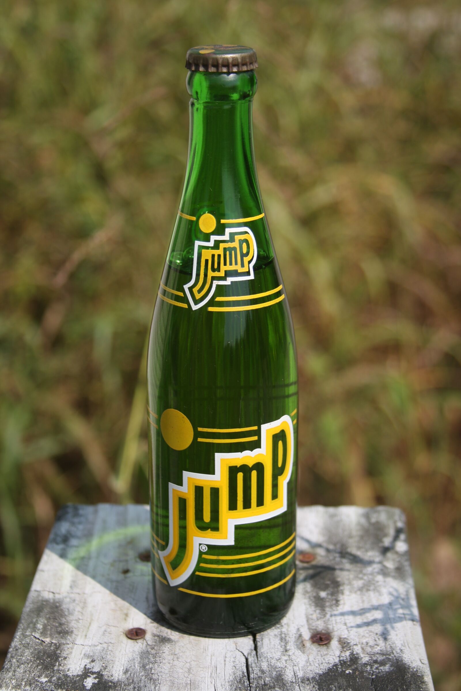 Canon EOS 40D sample photo. Jump vintage soda bottle photography