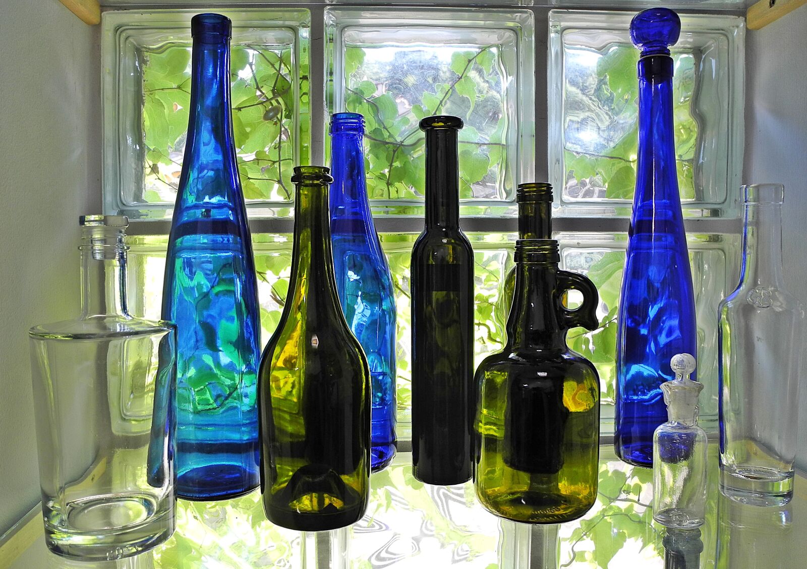 Nikon Coolpix P7000 sample photo. Bottle, glass, colored glass photography