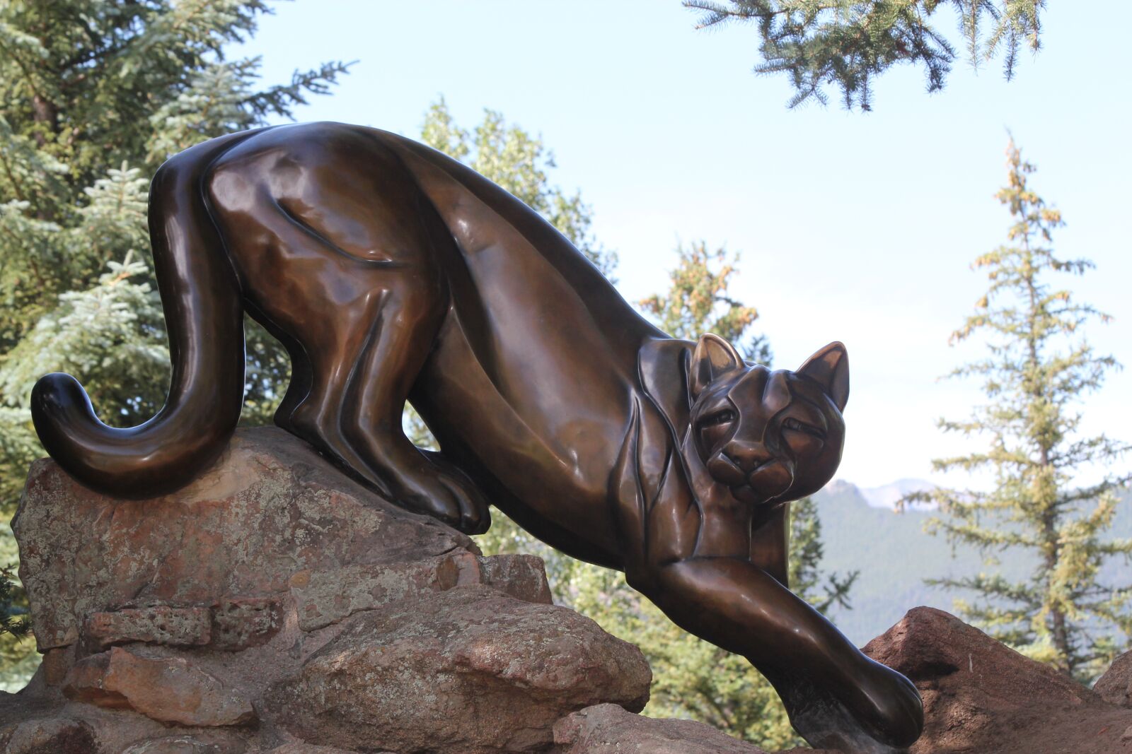 Canon EOS 550D (EOS Rebel T2i / EOS Kiss X4) sample photo. Lion, statue, rocky photography