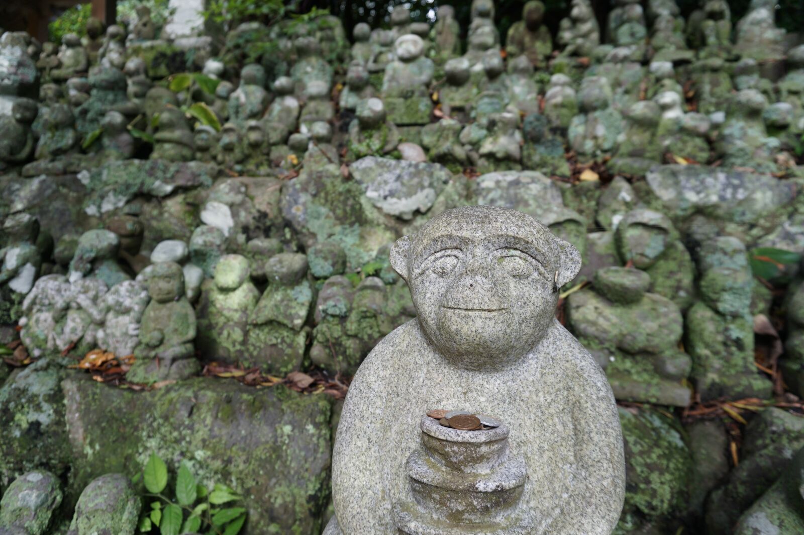 Sony a6300 sample photo. Monkey, stone statues, shrine photography