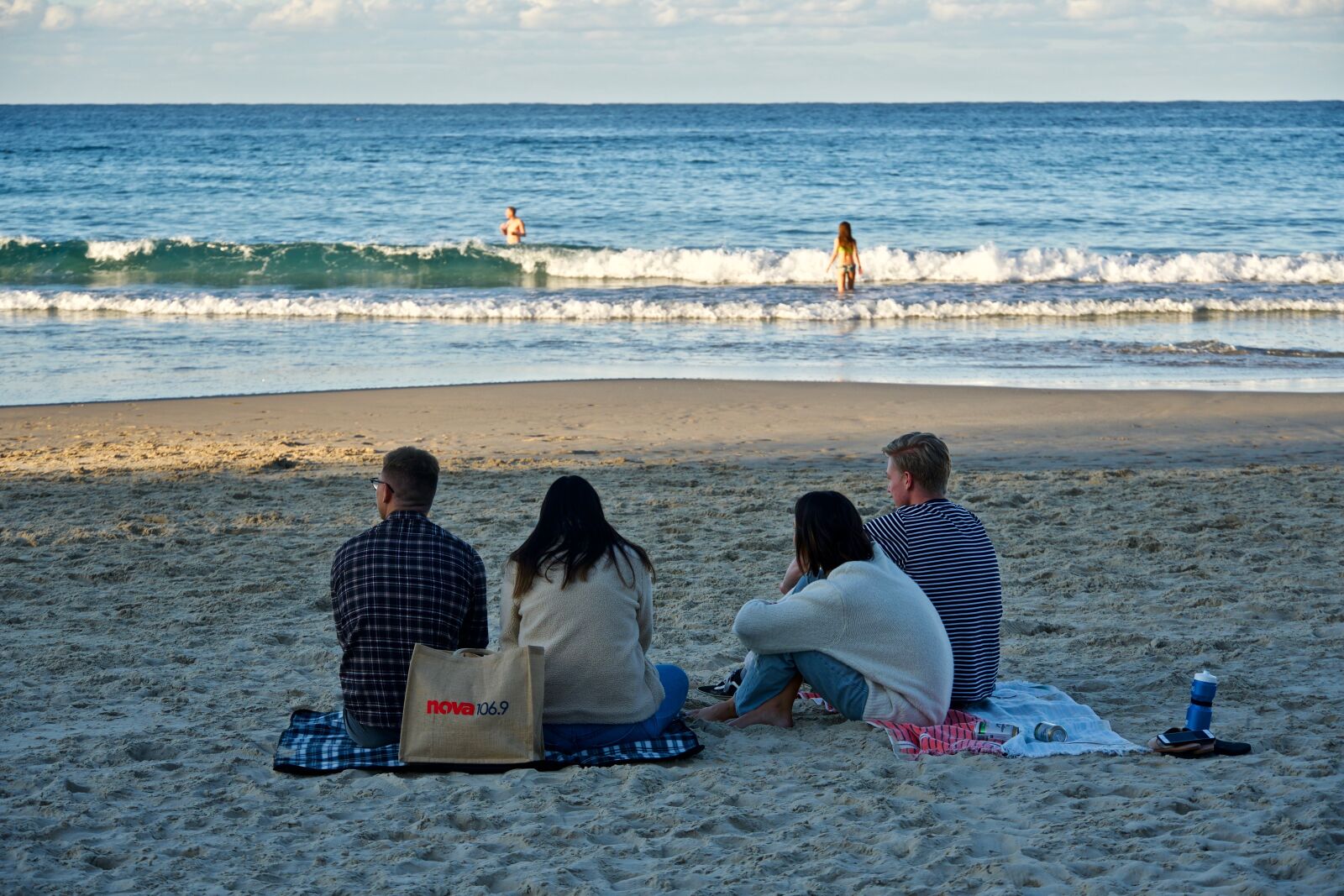 Sony E 18-135mm F3.5-5.6 OSS sample photo. Group, beach, coast photography