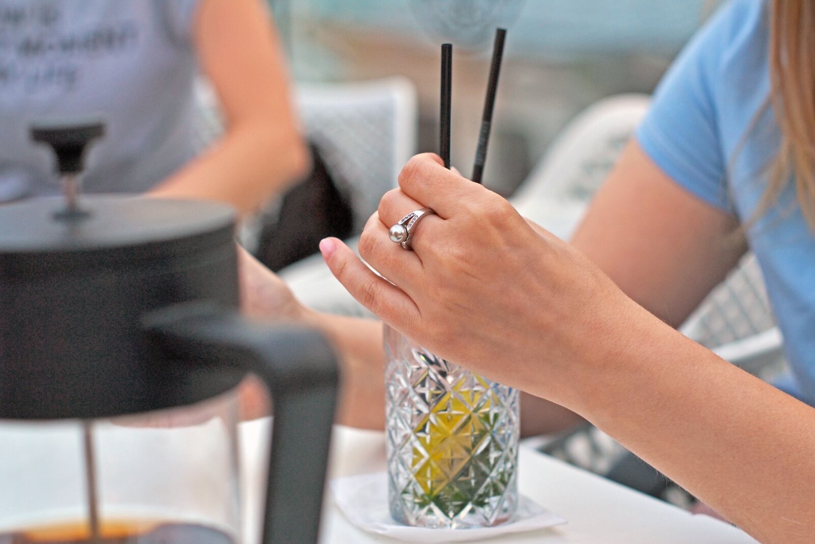 Nikon D3100 sample photo. Dinner, hand, ring photography