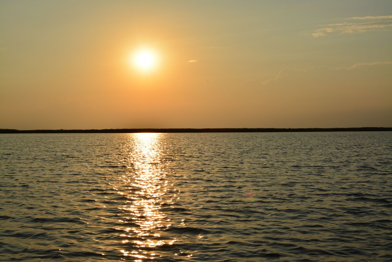 Nikon D5200 sample photo. Sunset, water, sun photography
