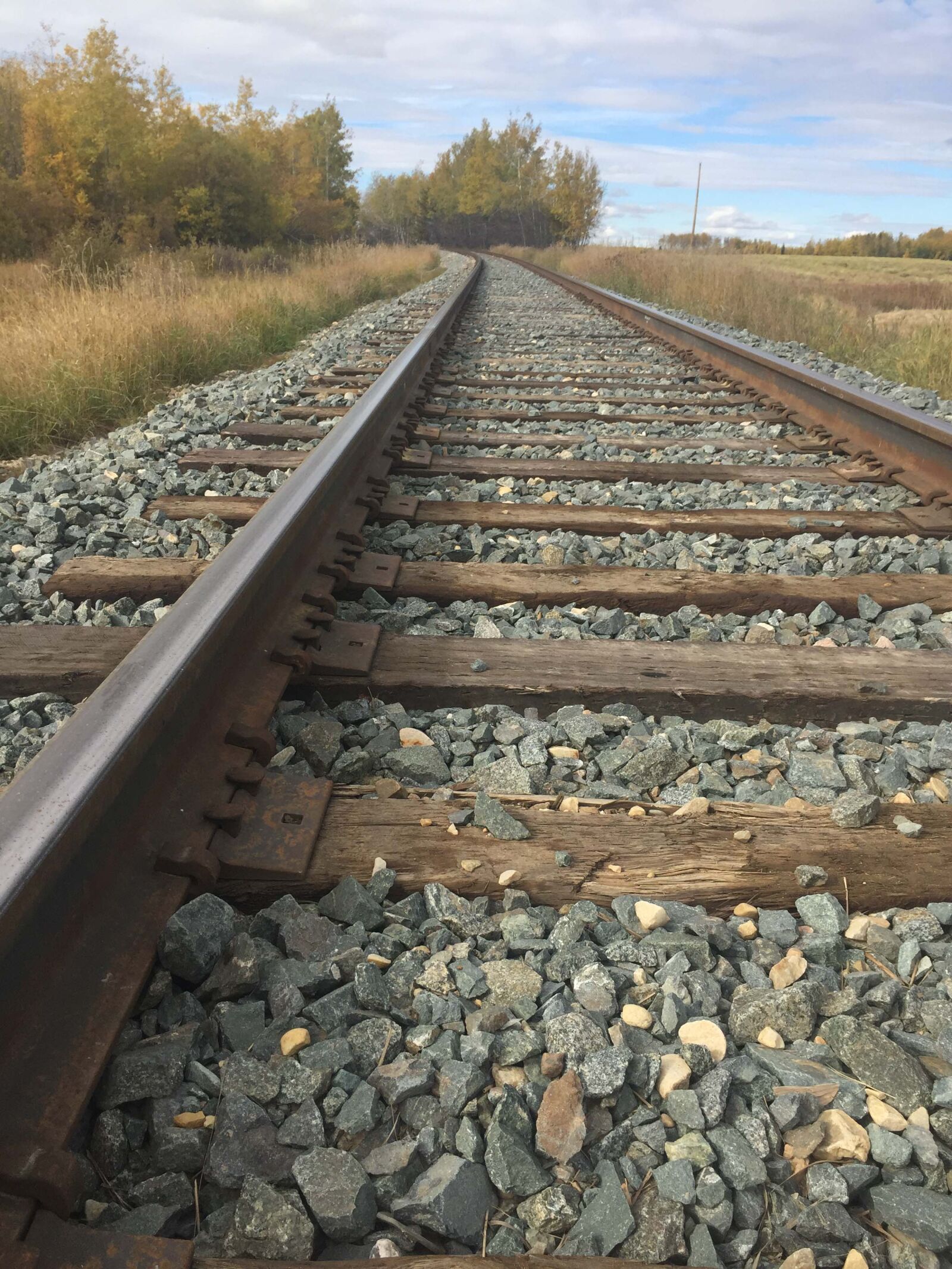 iPhone 6 back camera 4.15mm f/2.2 sample photo. Clouds, photograph, railroad, tracks photography