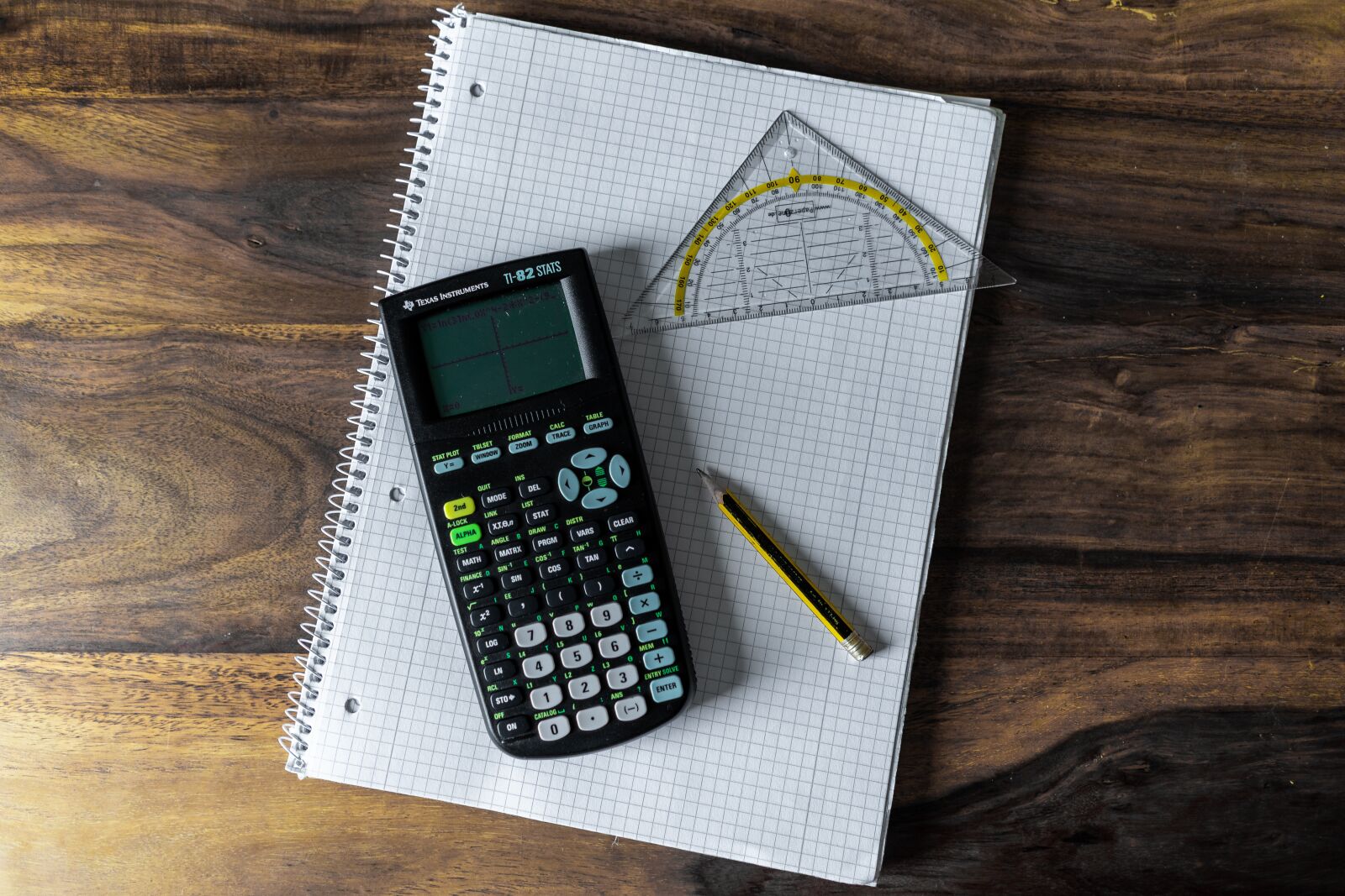 Sony a7 + Sony FE 28mm F2 sample photo. Calculator, writing pad, school photography