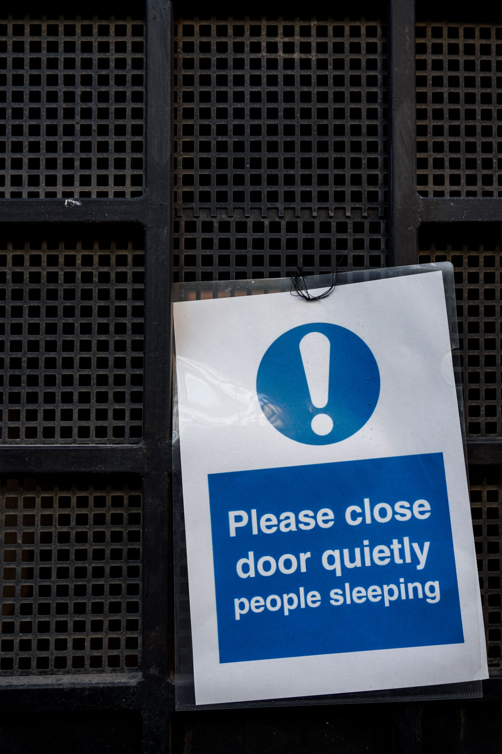 Sony ZV-E10 + Sony E 16-50mm F3.5-5.6 PZ OSS sample photo. People are sleeping sign photography
