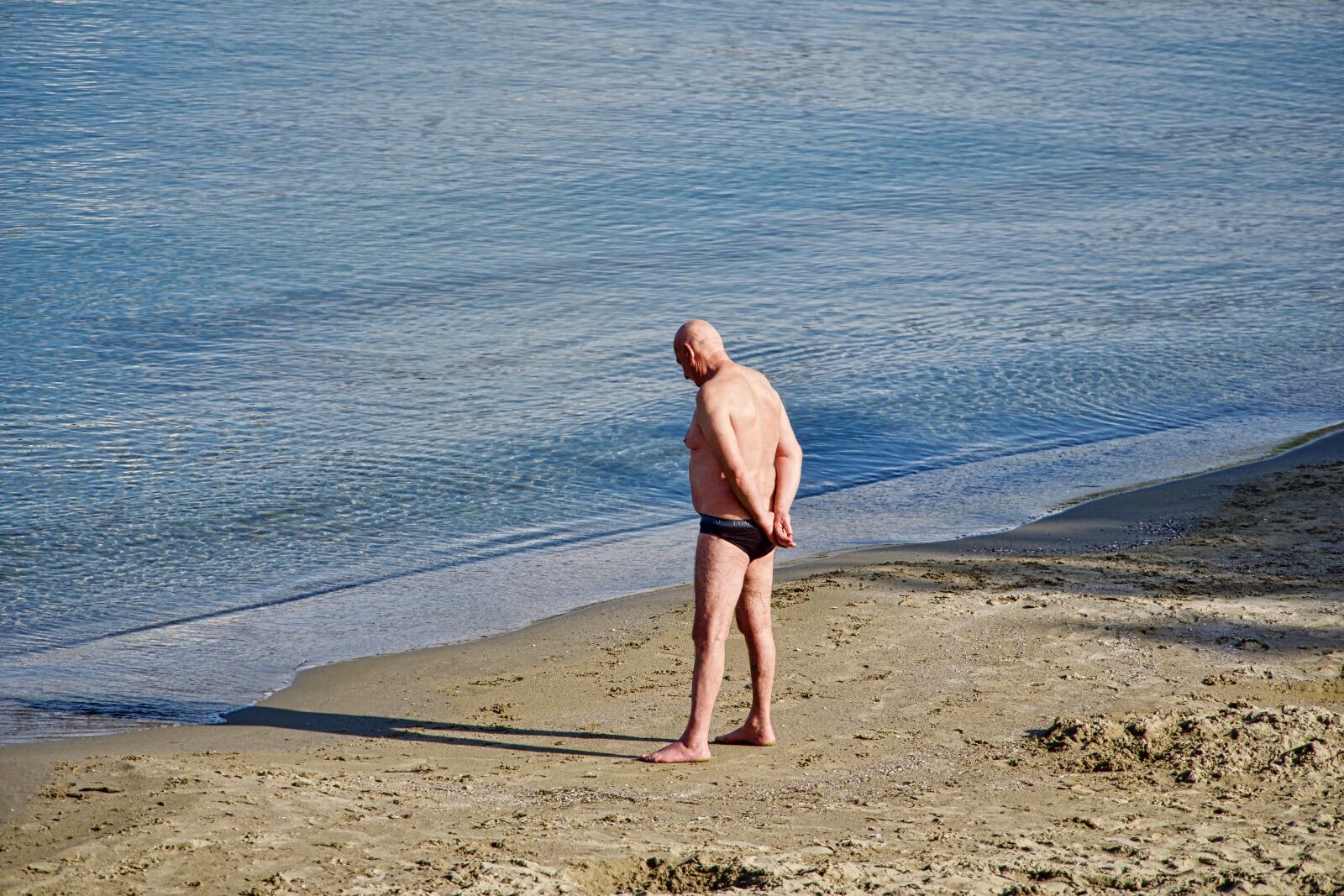 Sony a6500 sample photo. Man, contemplate, beach photography